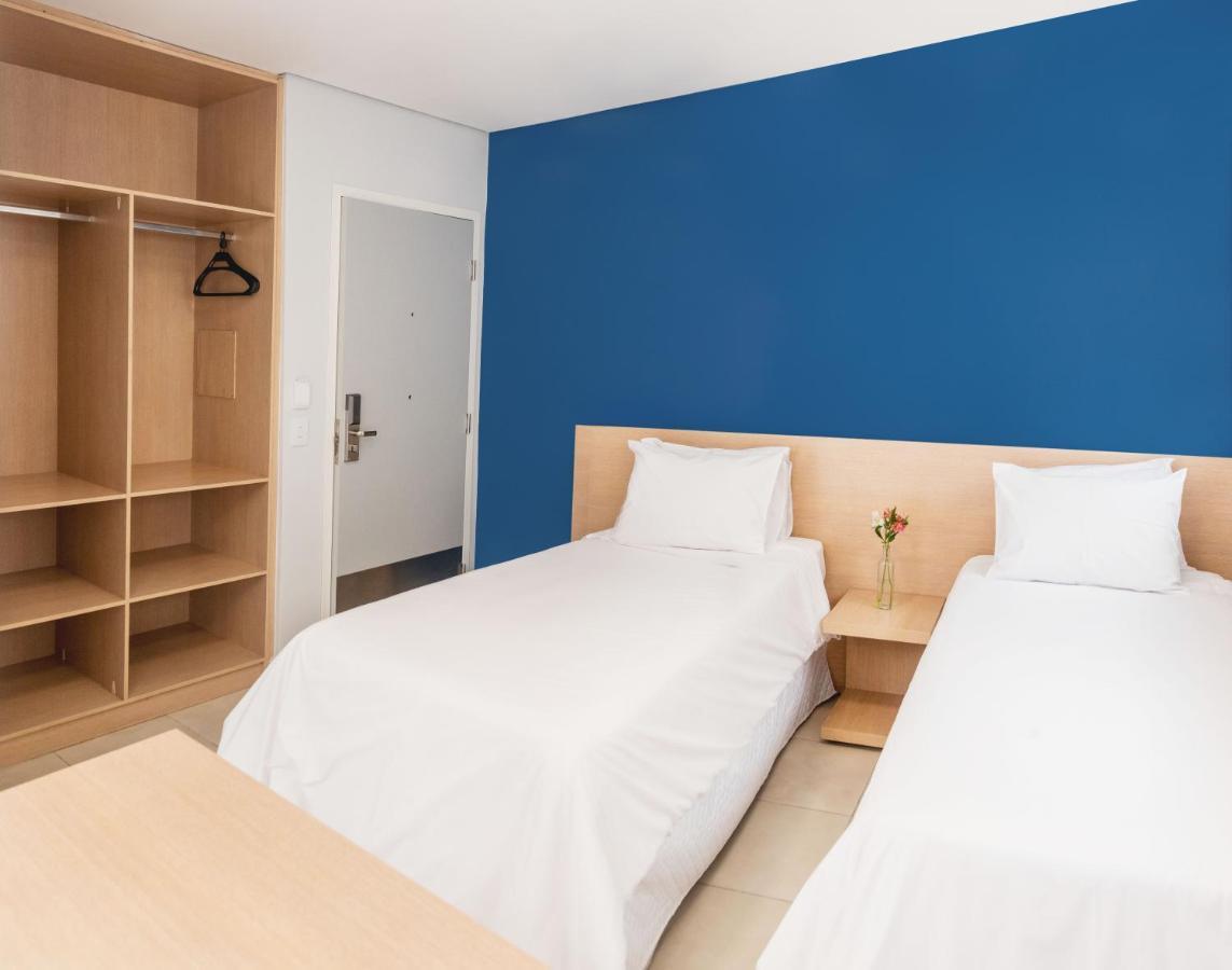 Quarto Quádruplo Executivo Premium