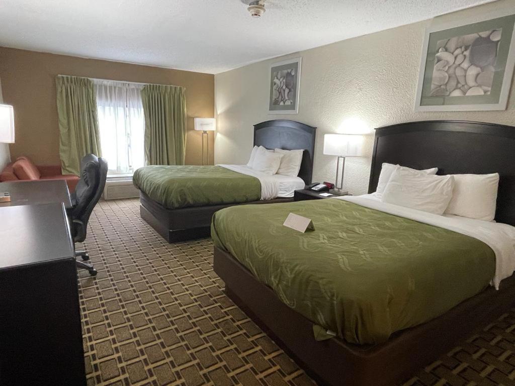 Quadruple Room with Two Queen Beds and Pool View - Non Smoking