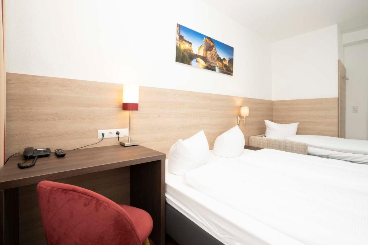 Dreibettzimmer