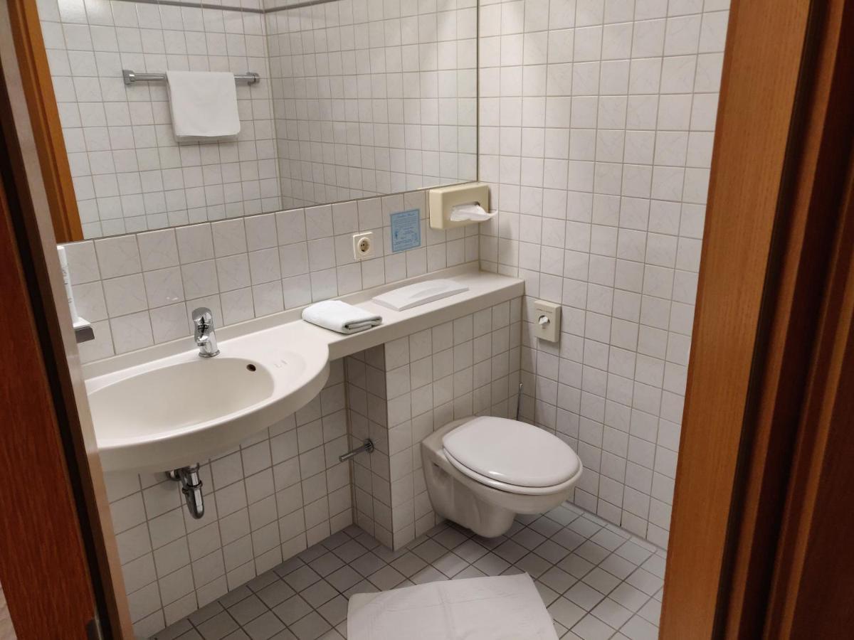 Einzelzimmer mit Gartenblick
