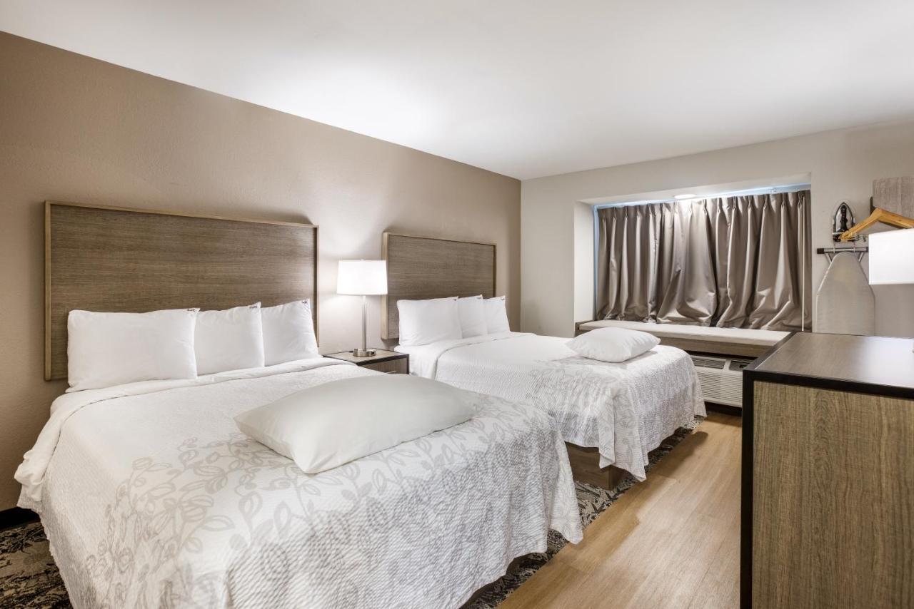 Premium Room with 2 Queen Beds Smoke Free (Upgraded Bedding and Snack Box)