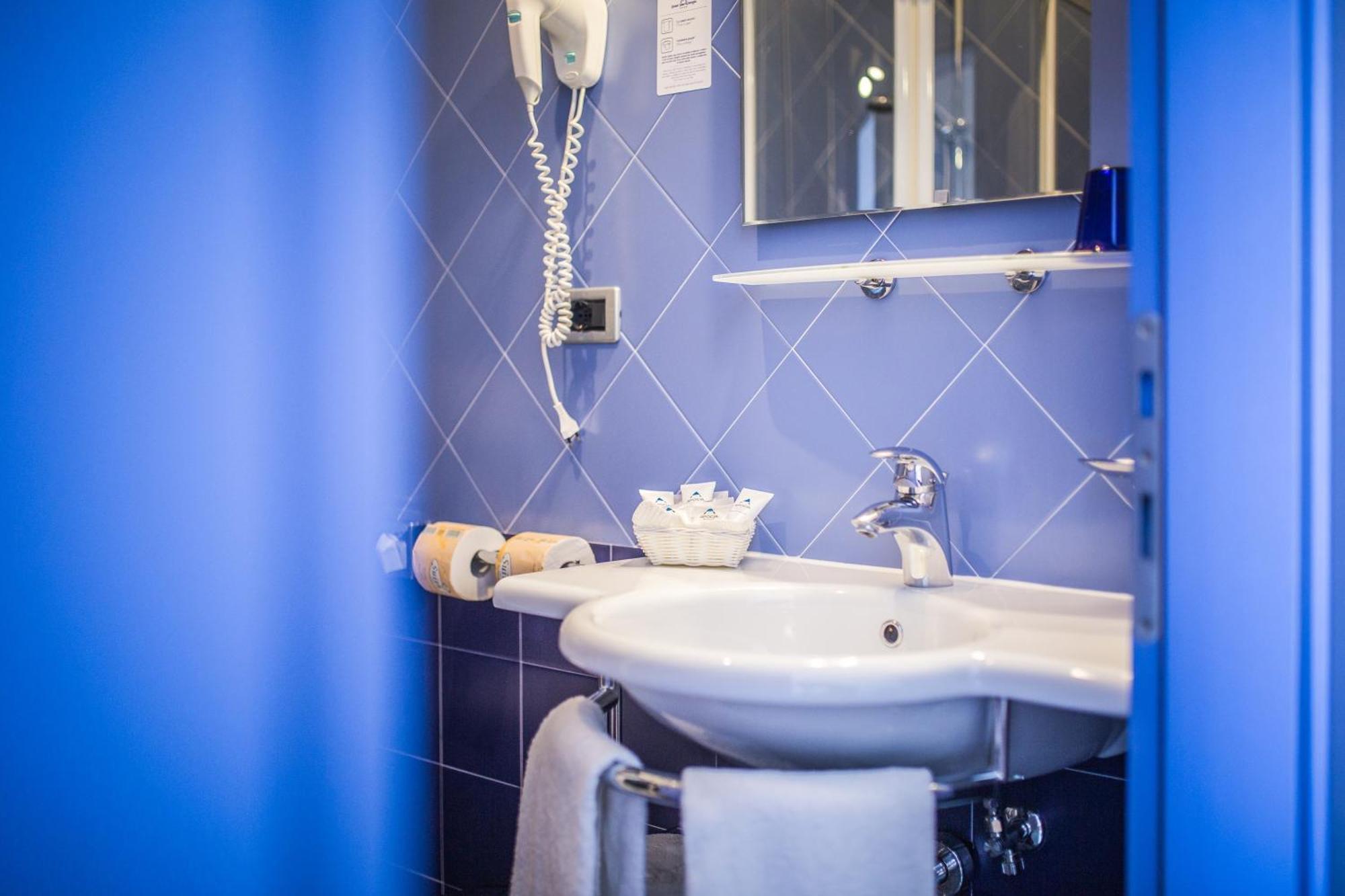 Dreibettzimmer mit Meerblick