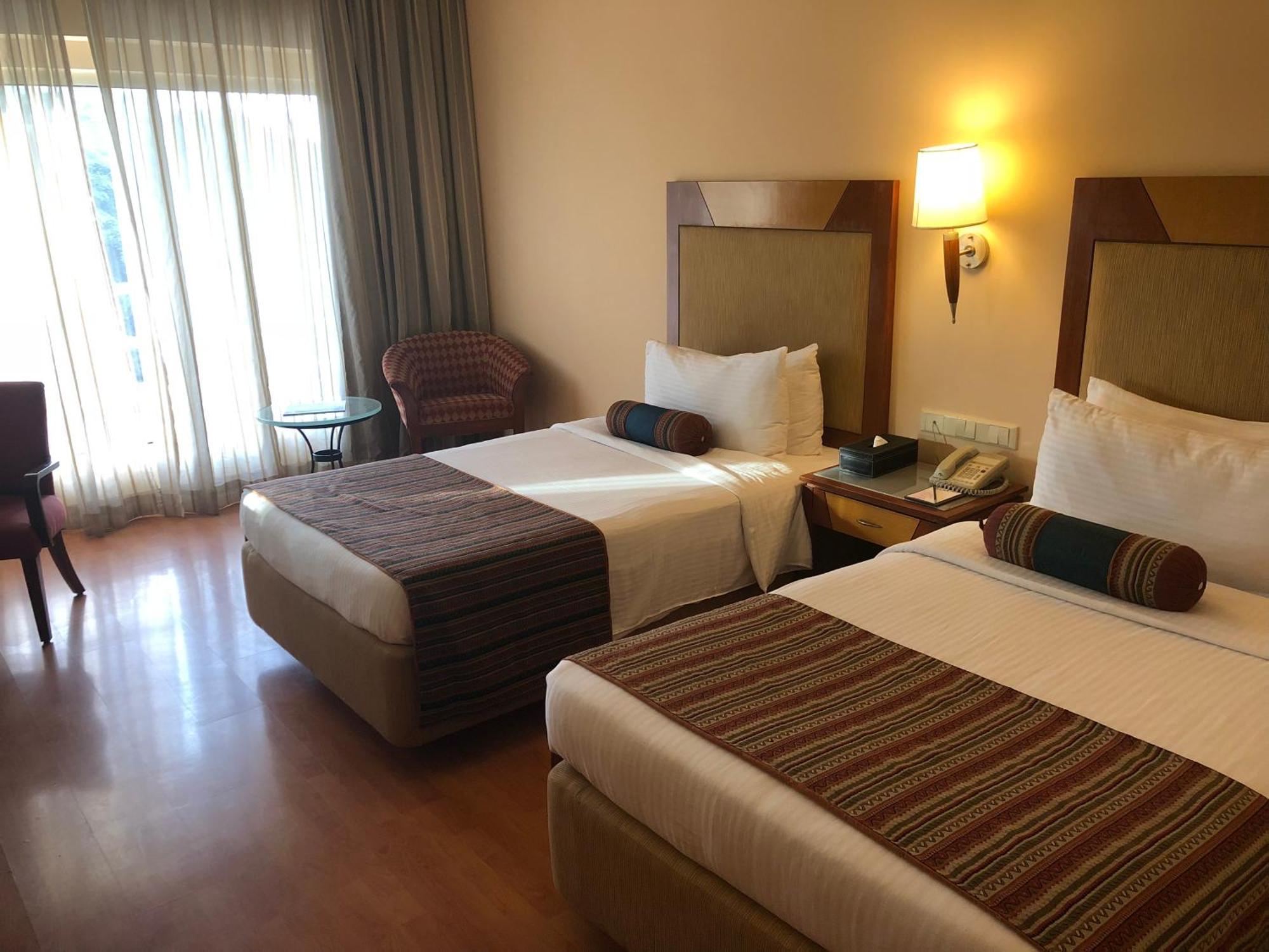Premier Pool View Twin room on Food Beverage Spa on Laundry service