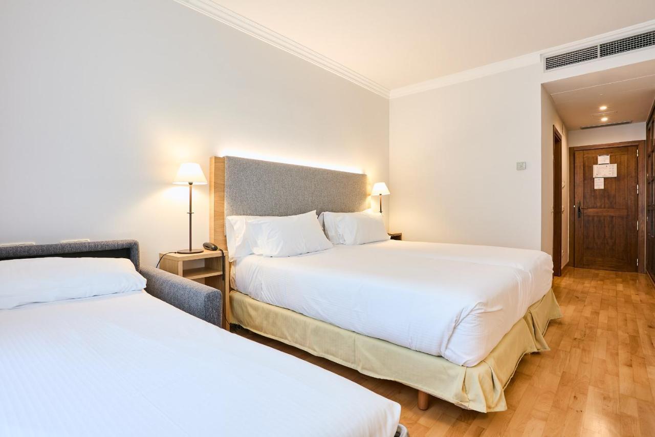 Habitación Doble con cama supletoria (3 adultos)