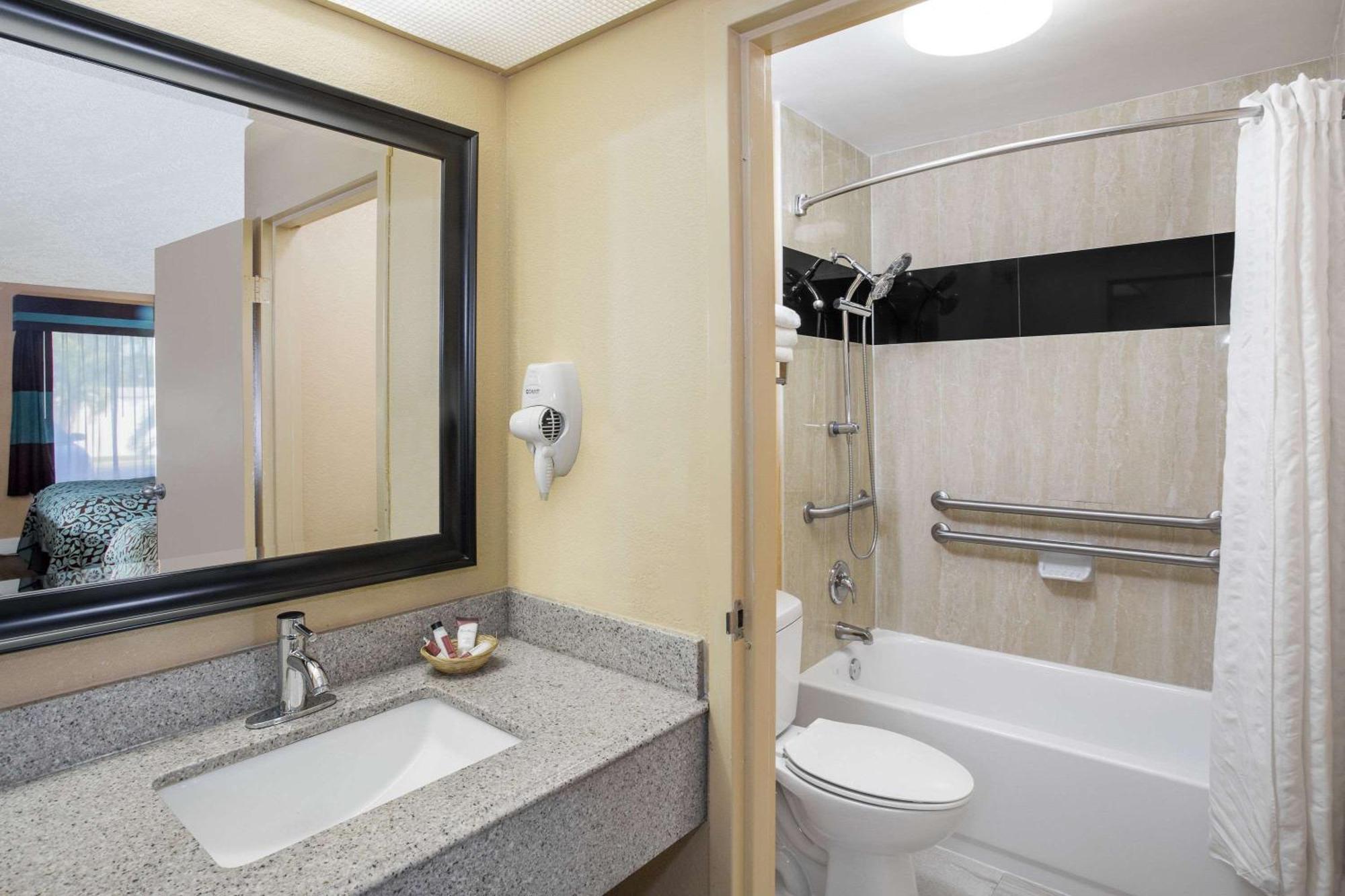 Deluxe Quadruple Room Two Double Beds Disability Access Non-Smoking