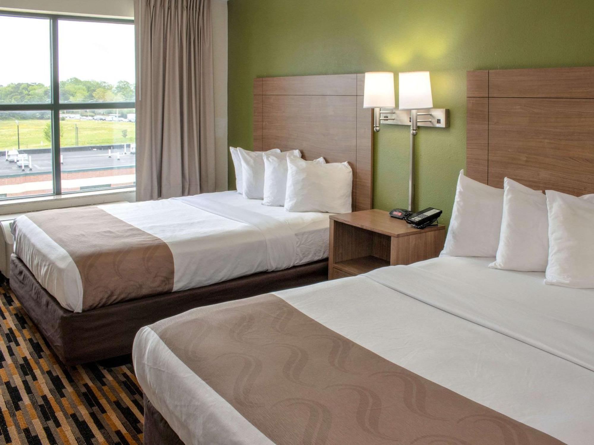 Suite Two Queen Beds Roll Shower Accessible or Non-Smoking