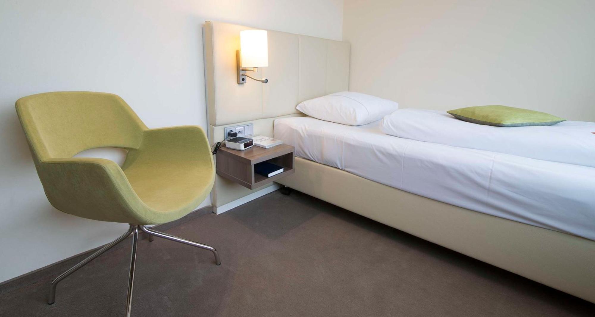 Business Single Room with Roll-In Shower and Adjustable Shower Chair - Mobility Accessible