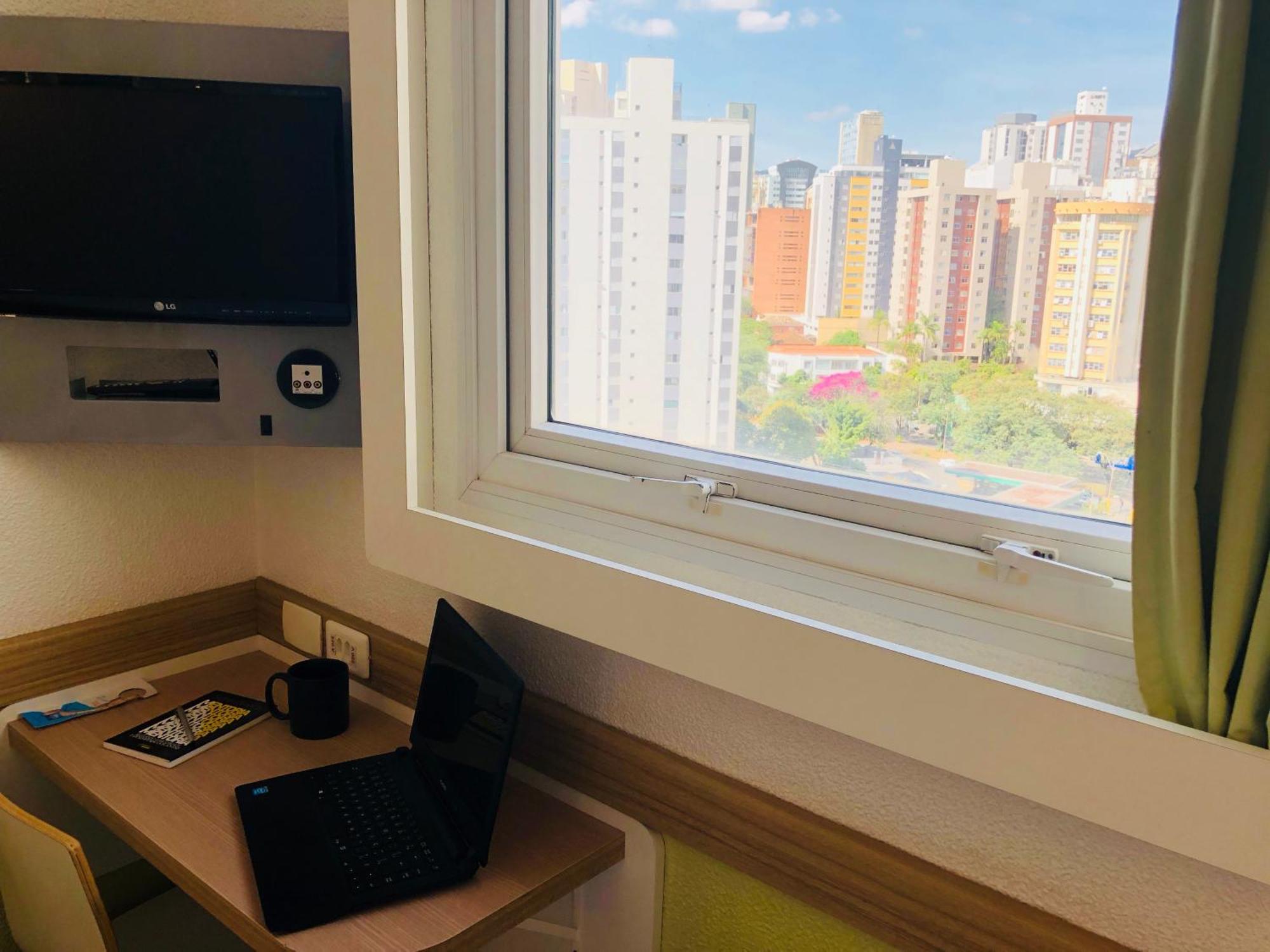 Quarto Triplo com 2 Camas de Solteiro e 1 Cama em Beliche