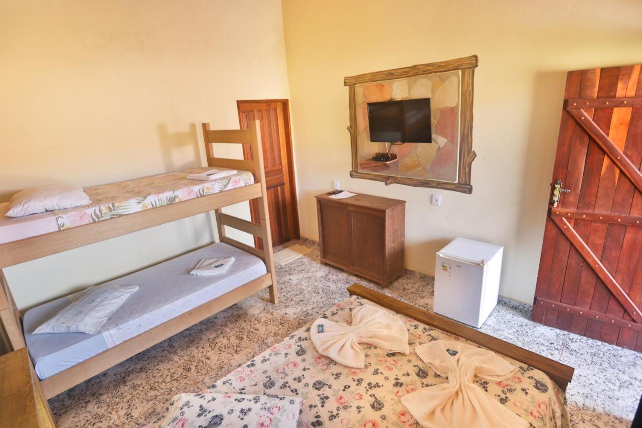 Quarto Duplo com Varanda (2 Adultos + 1 Criança)