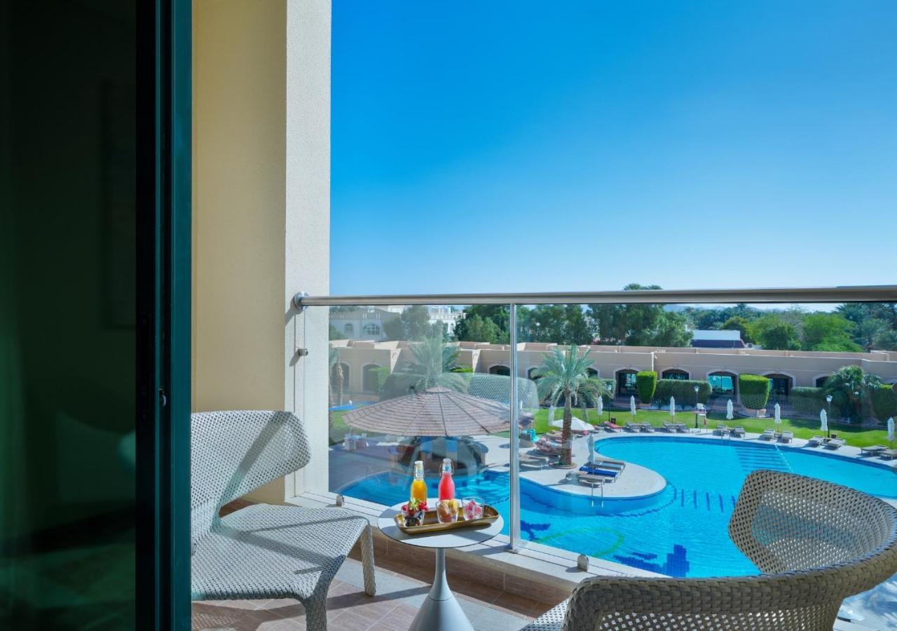 Pool View Room with Balcony - King Bed New Wing
