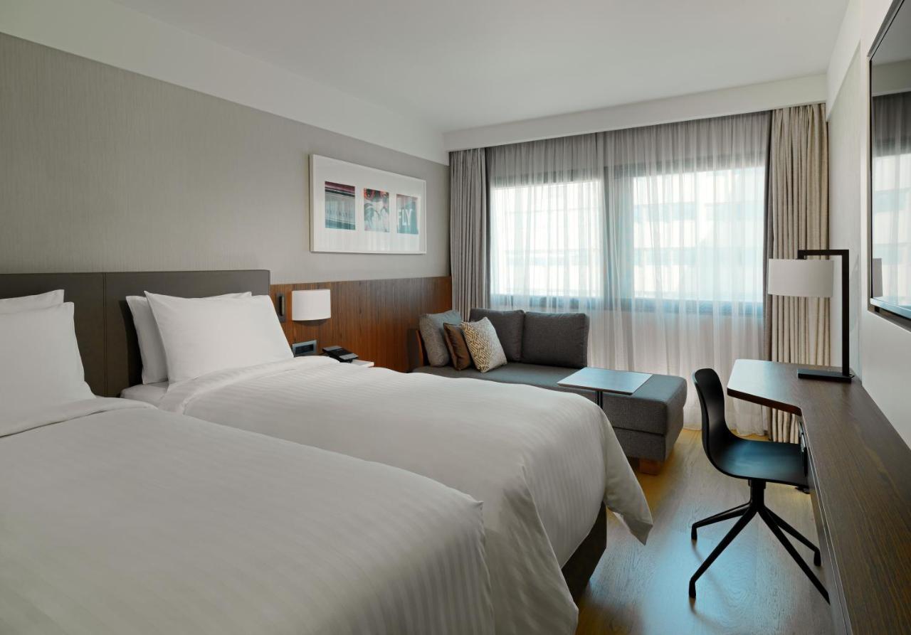 Guest Room with Two Twin Beds and View