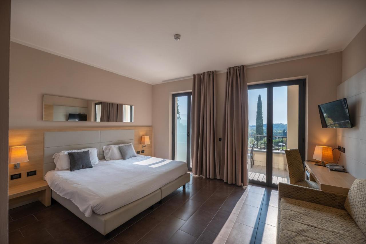 Camera Quadrupla Prestige con Vista Lago e Balcone