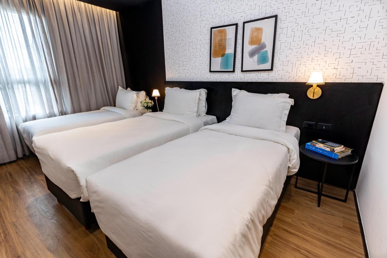 Quarto Triplo Standard com 3 Camas de Solteiro