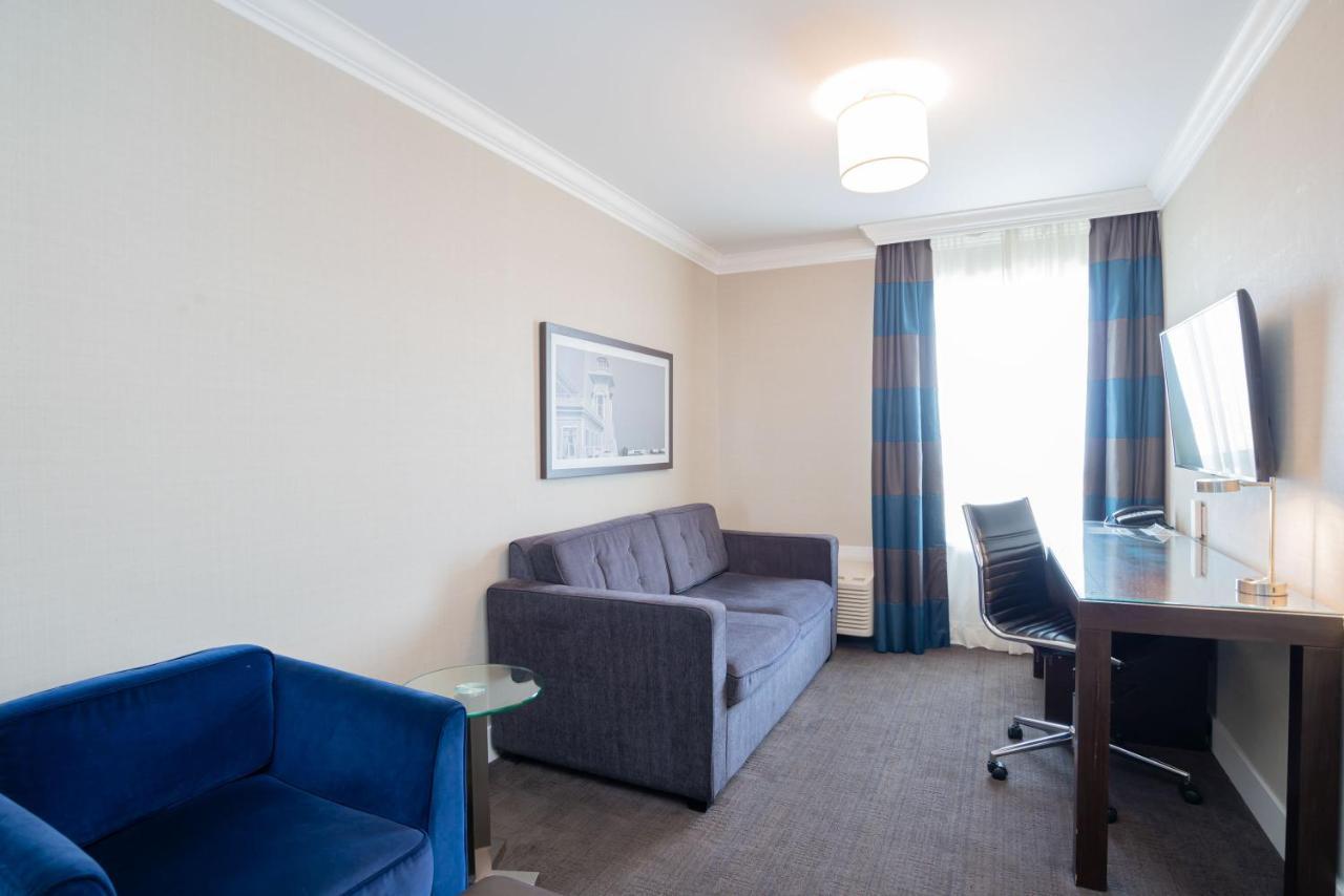 Grand Suite 1 King Bed Kitchenette Sitting Area