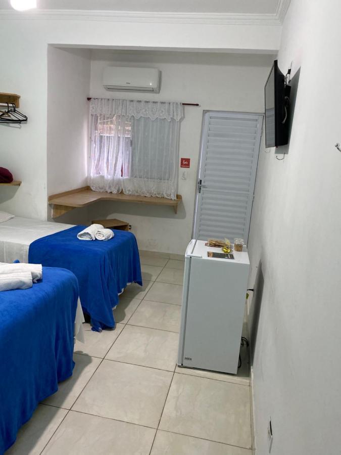 Quarto Triplo com Banheiro Privativo