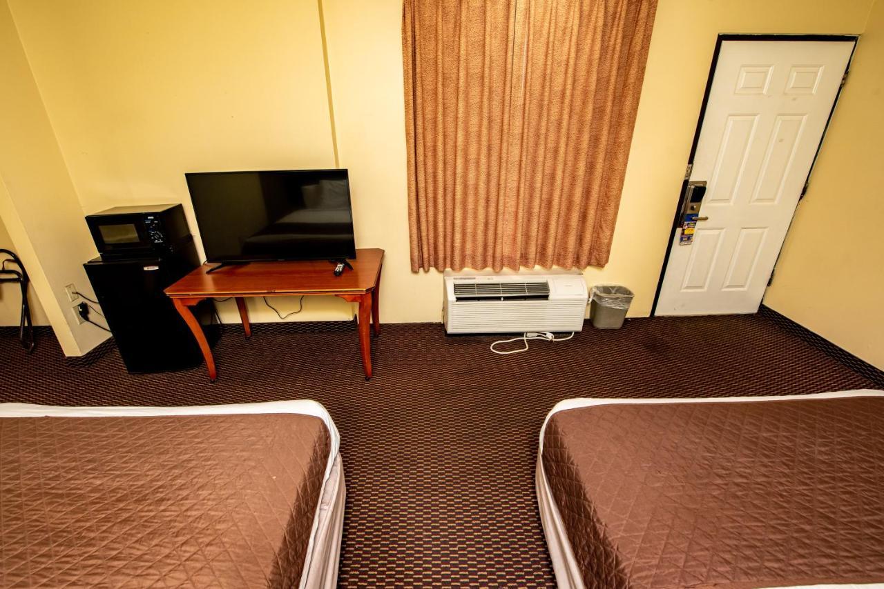 Double Room with Two Full Beds - City View (Non Smoking)