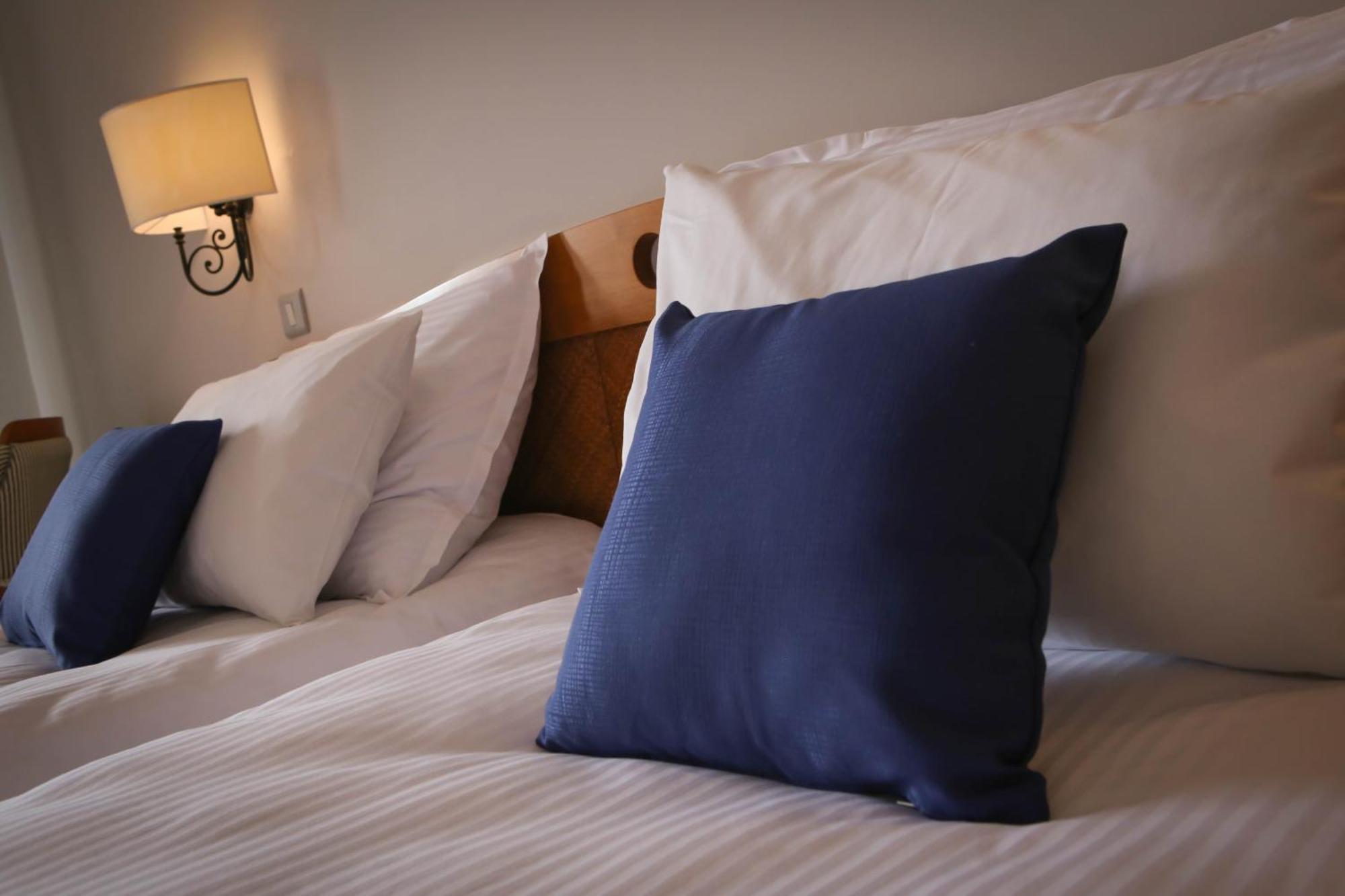 Dreibettzimmer mit Meerblick