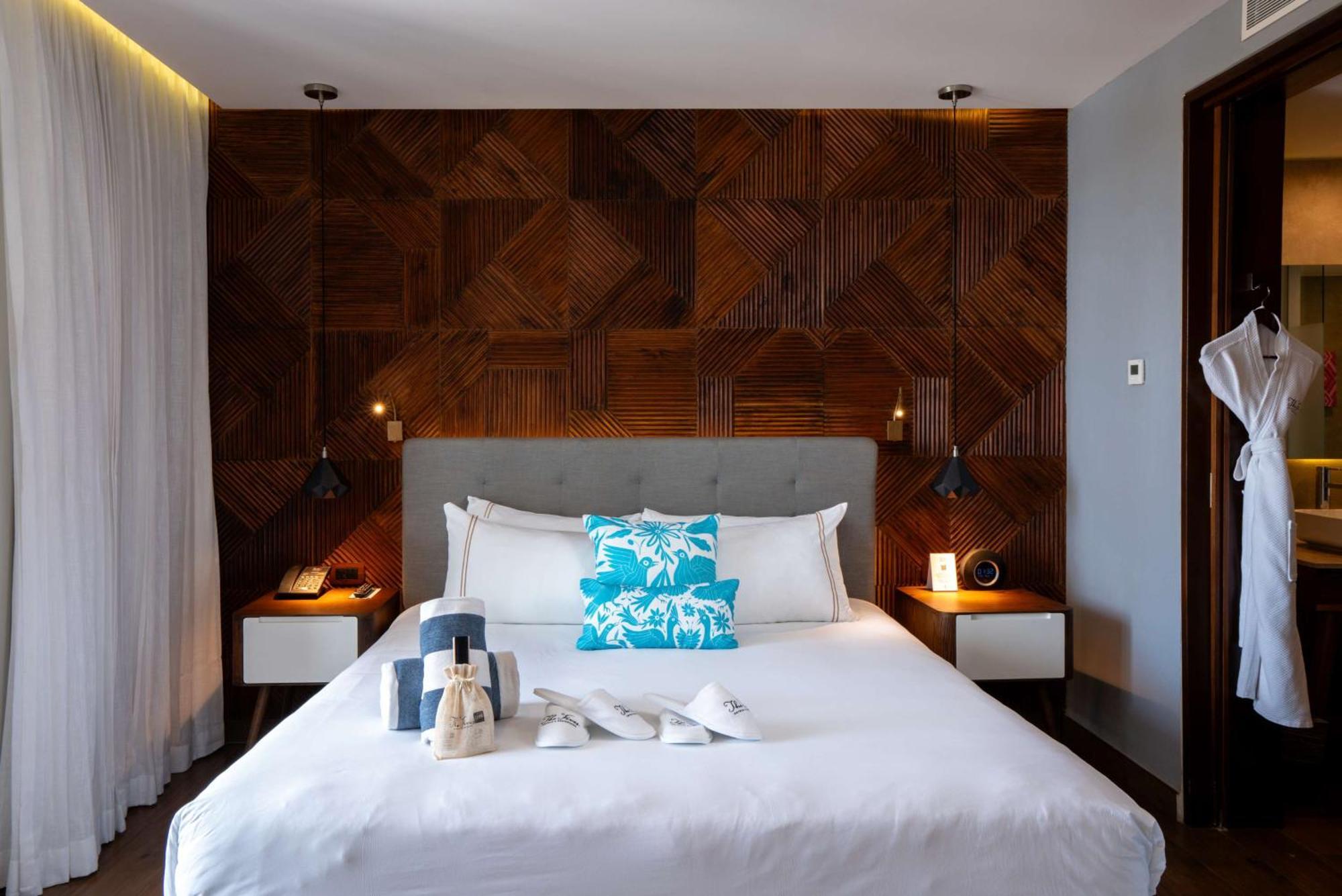 Suite de 2 dormitorios con 1 cama extragrande y 2 camas grandes