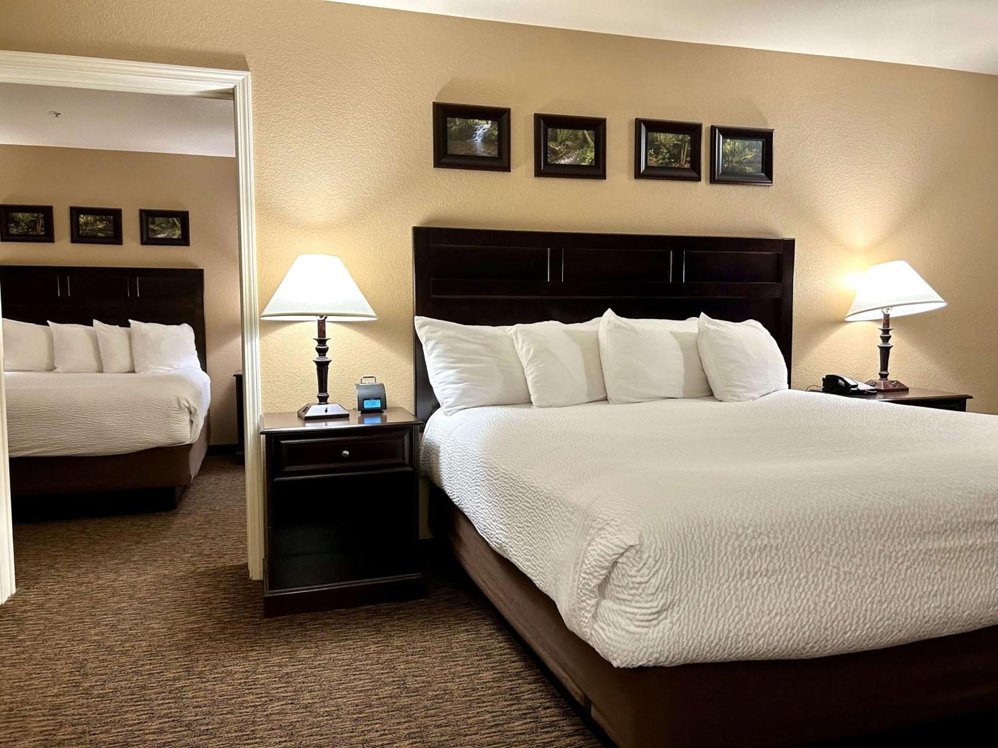 Two-Room Suite One King One Queen Bed Non-Smoking