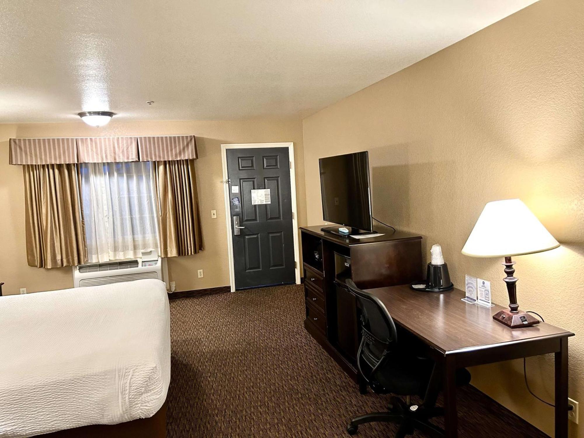 Two-Room Suite One King One Queen Bed Non-Smoking