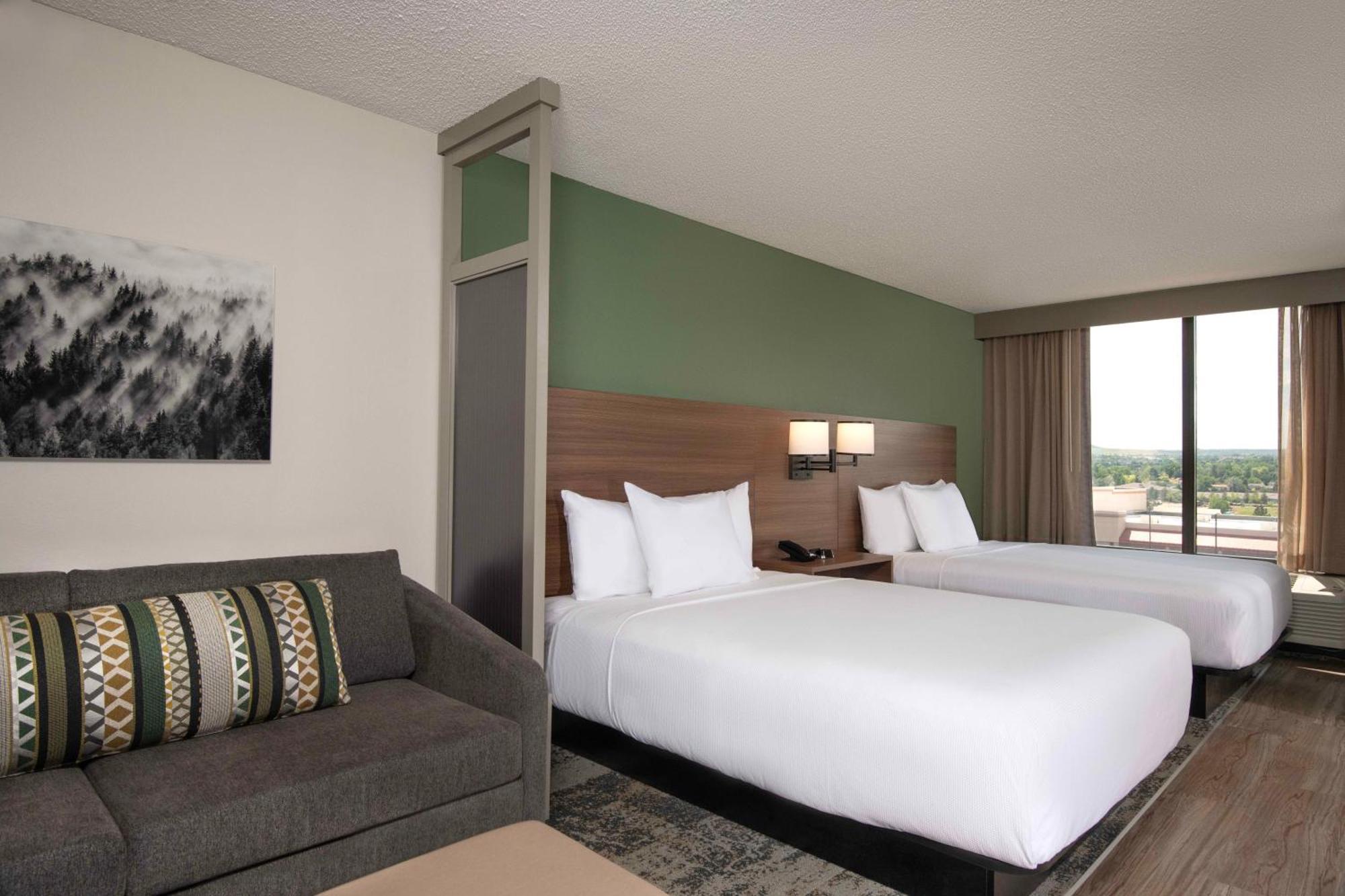 Queen Room with Two Queen Beds and Sofa Bed