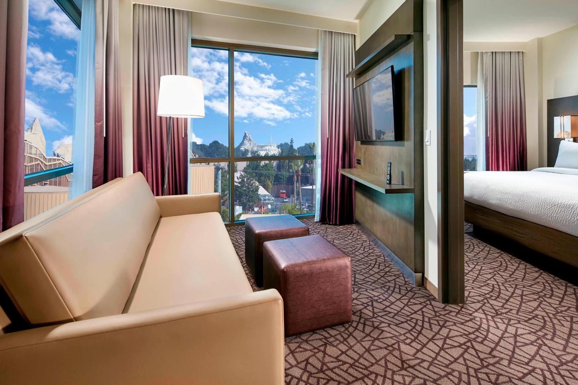 One Bedroom 1 King Theme Park View Smaller Suite Sofa Bed
