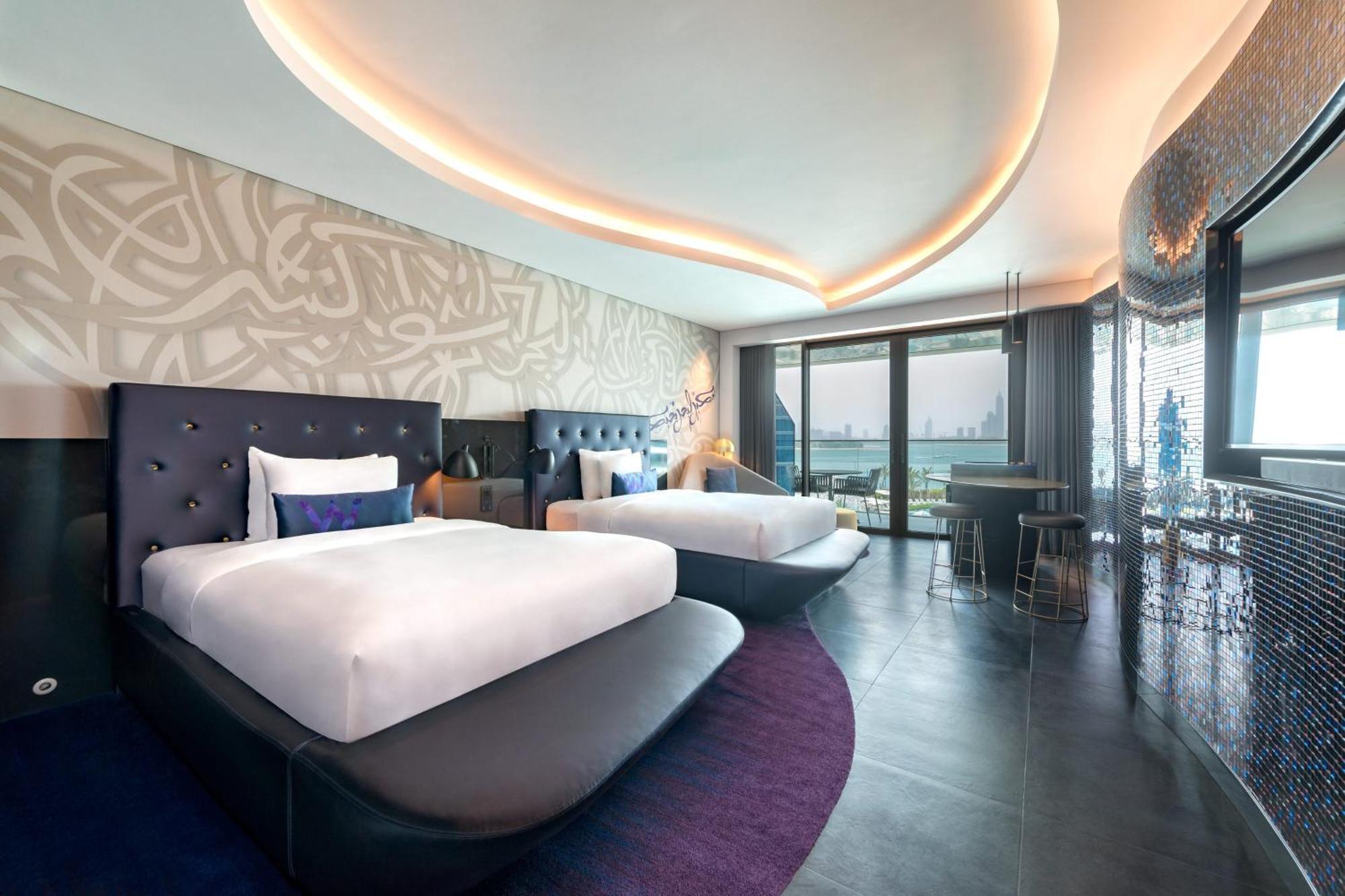 Spectacular Double Room 2 Double Beds Skyline view Private Balcony includes 3 hours of Flow of Selected Drinks