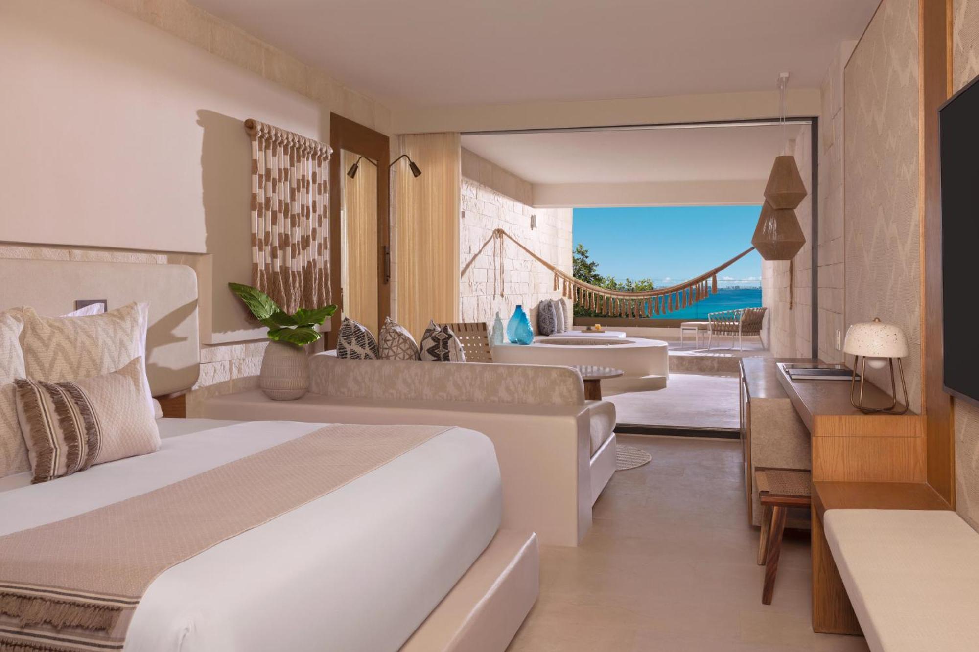 Suite Junior Signature con bañera de hidromasaje y vistas al océano - Cama extragrande