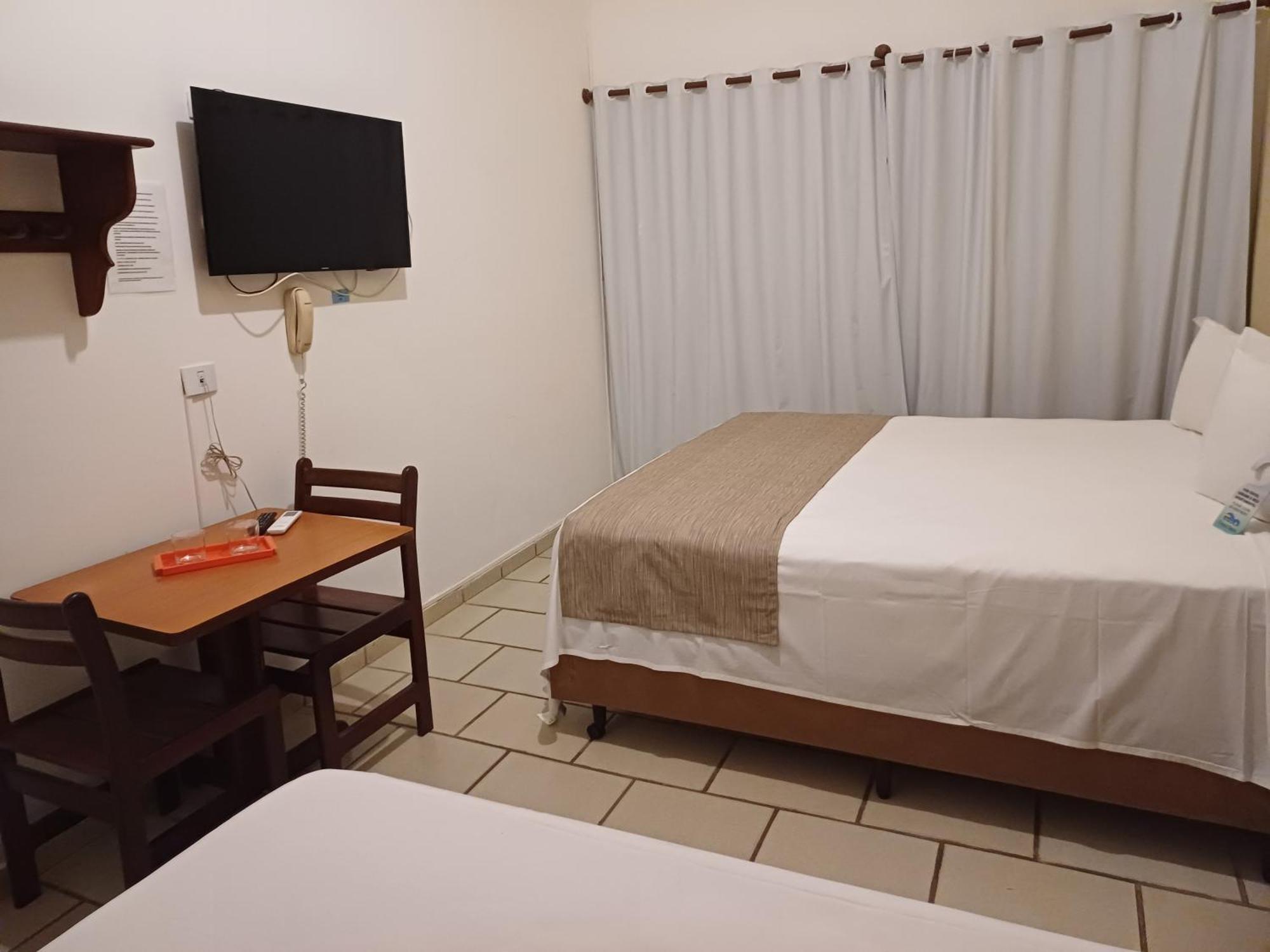 Quarto Deluxe com Cama de Casal ou 2 de Solteiro