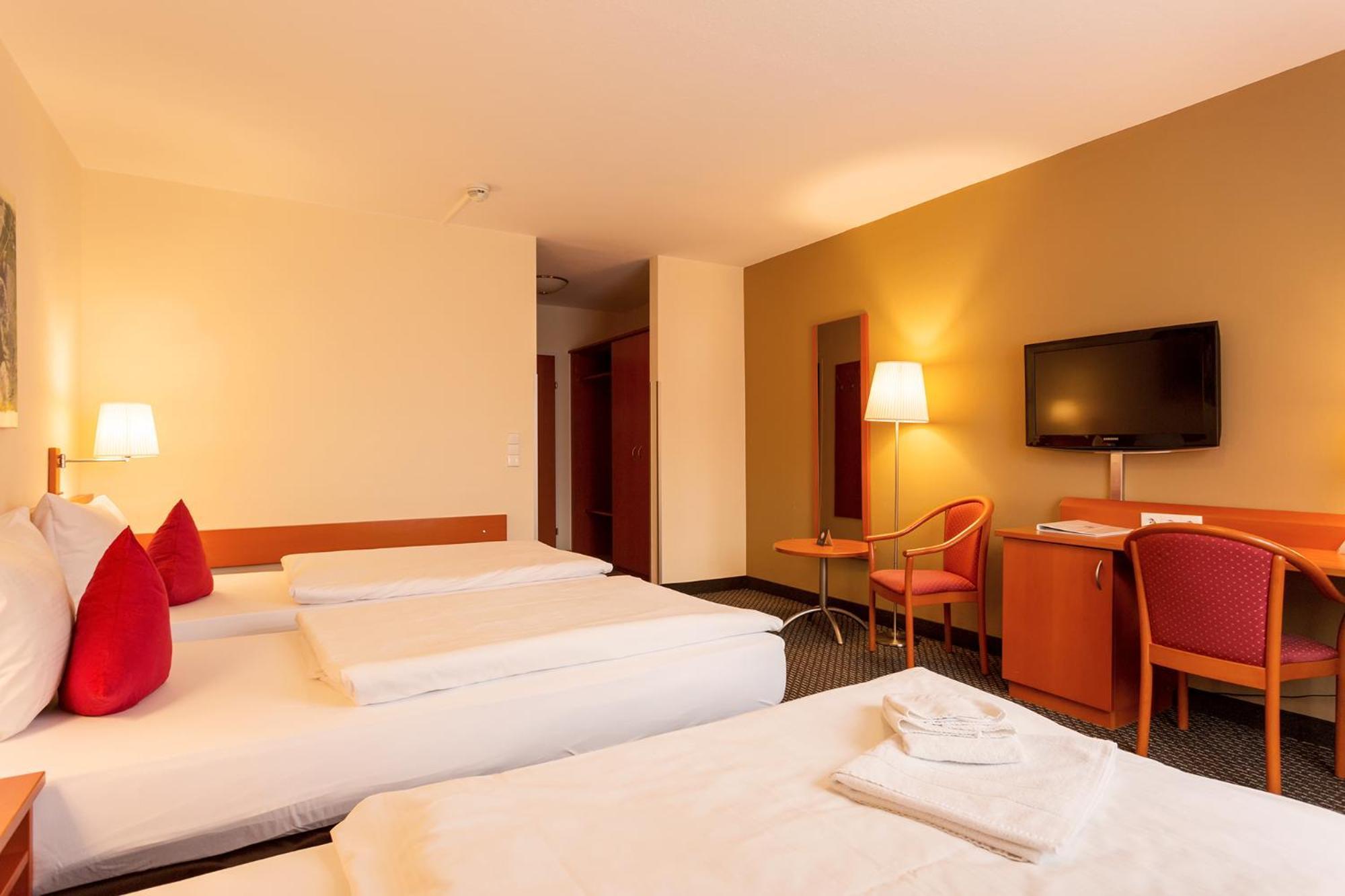 Dreibettzimmer