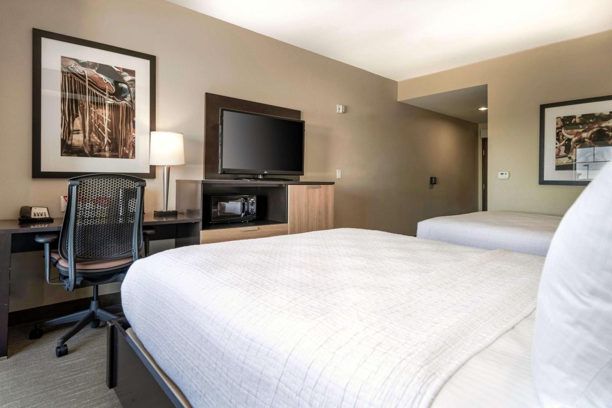 Room Two Queen Beds Bath Tub Disability Access or Non-Smoking