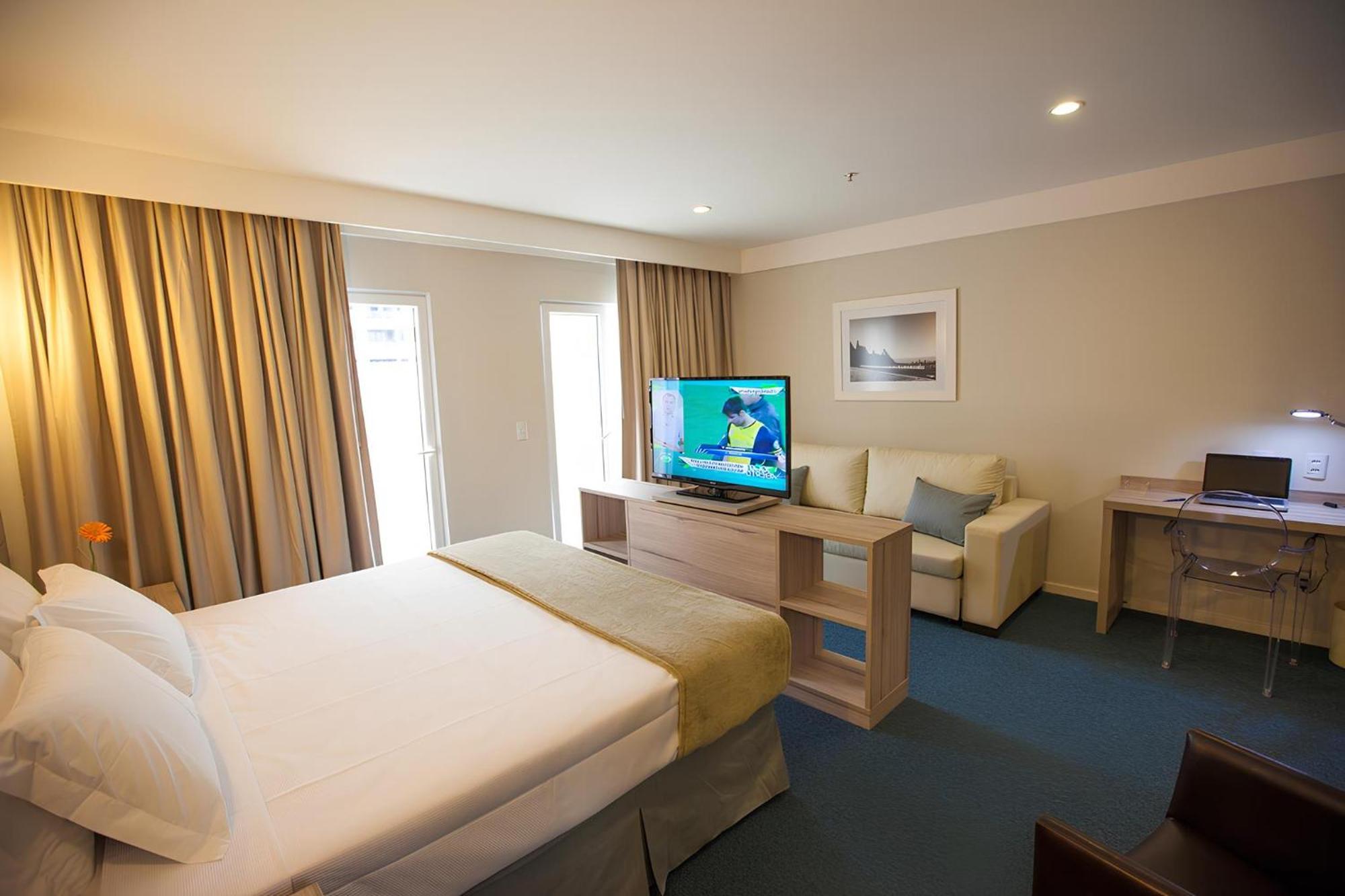 Premium Double - 1 King Bed and 1 Sofa bed
