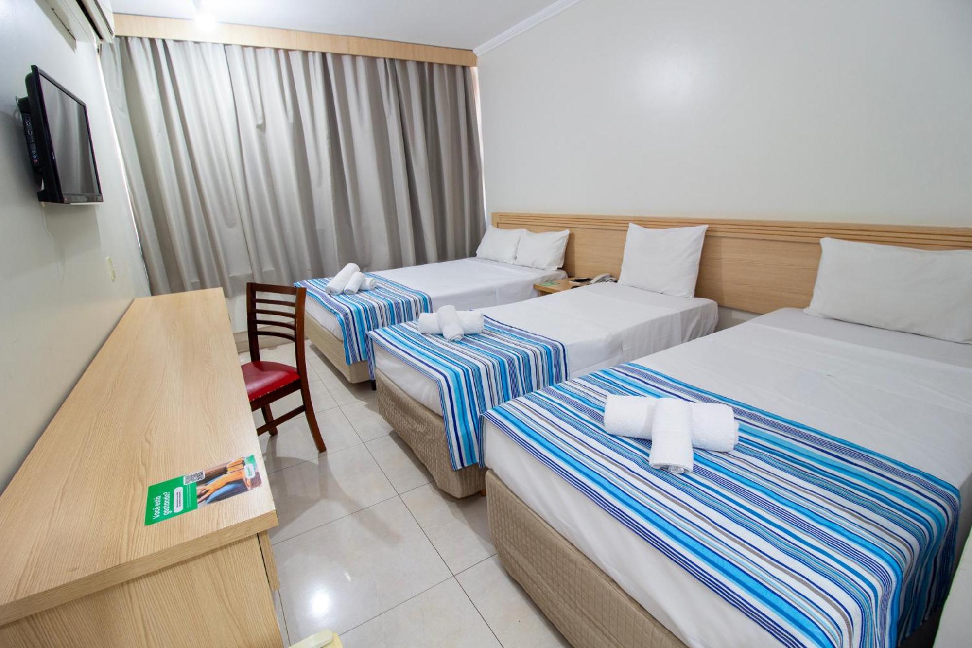 Quarto Triplo Executivo