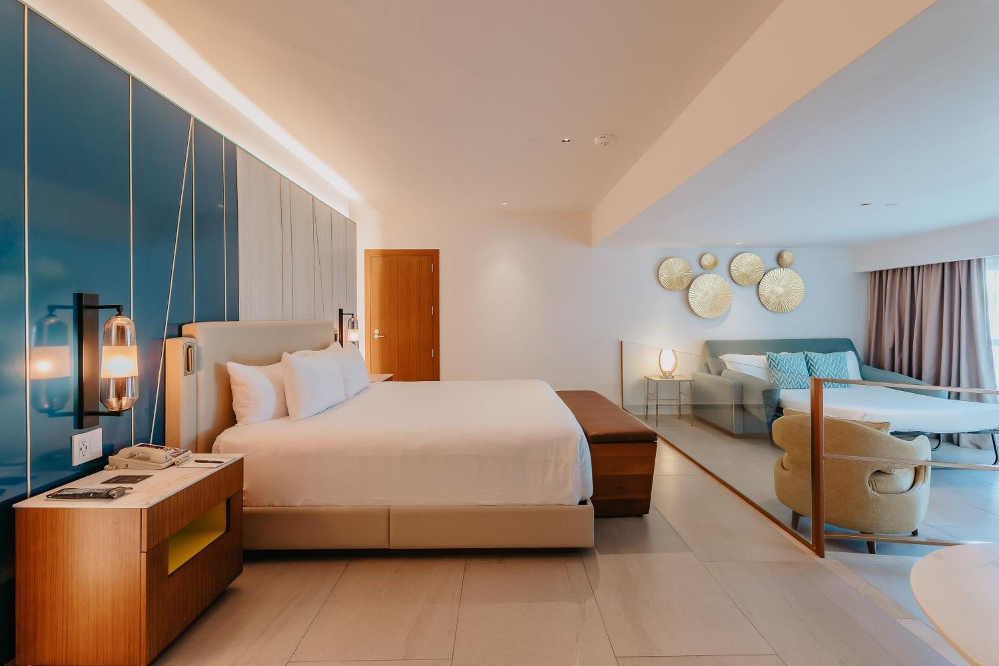 Suite Caraïbes Accessible aux Personnes à Mobilité Réduite avec Lit King-Size et Canapé-Lit