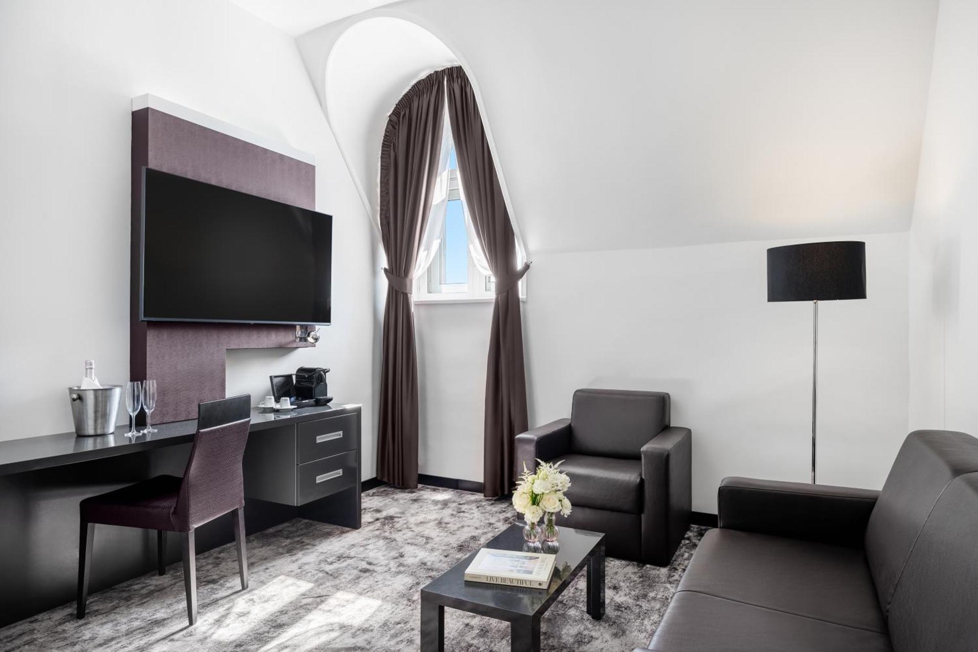 Junior Suite mit 1 Kingsize-Bett und Sofa