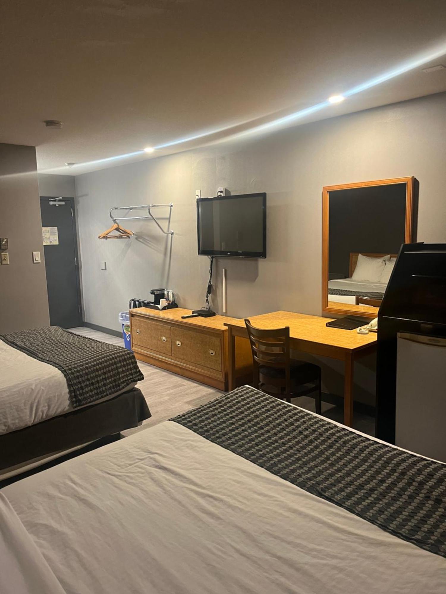 Queen Room Two Queen Beds Exterior Entrance or Non-Smoking