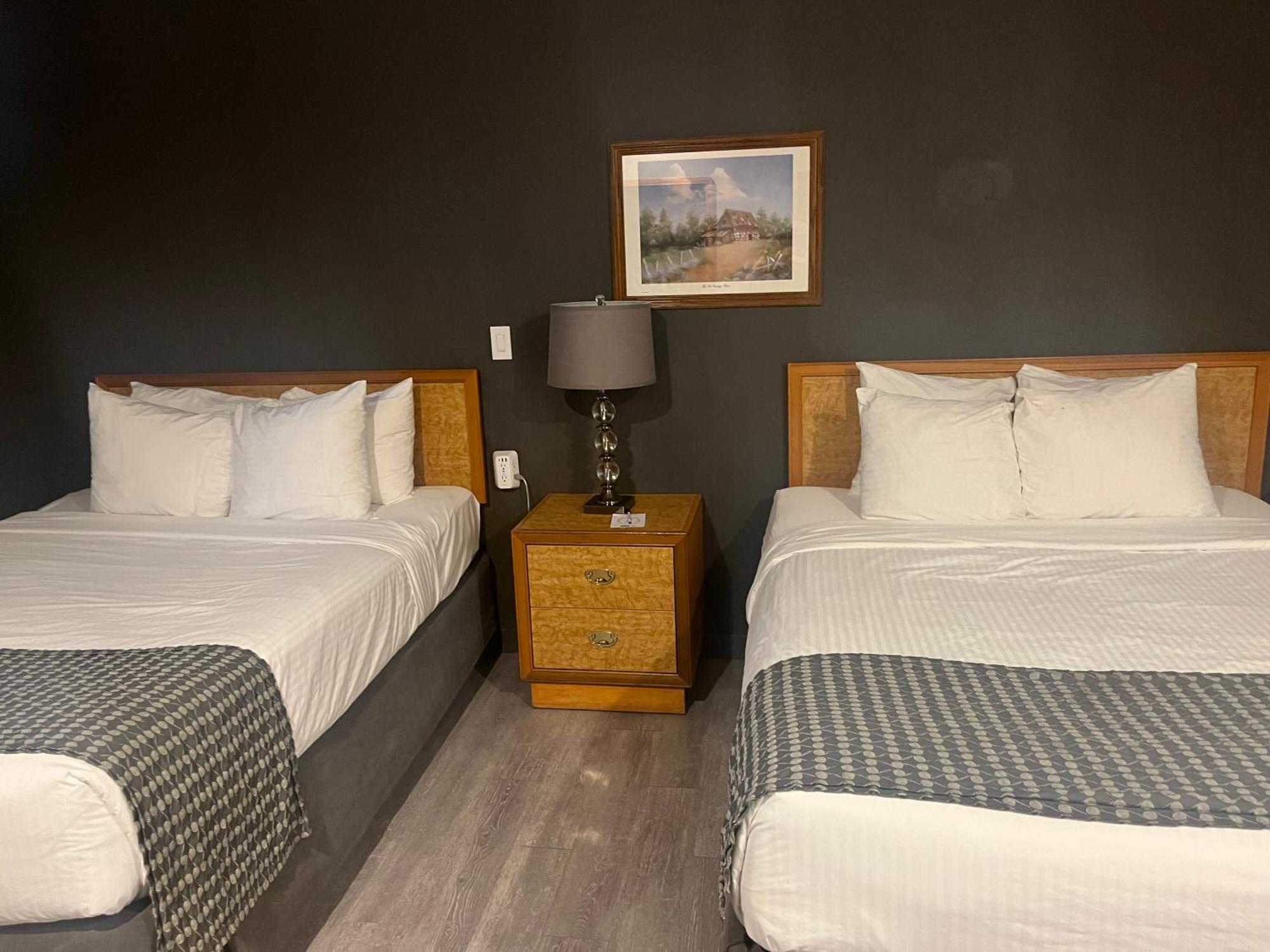 Queen Room Two Queen Beds Exterior Entrance or Non-Smoking