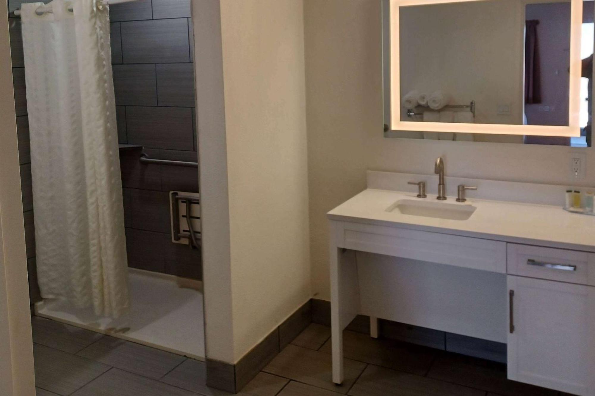 Queen Room Mobility Access Roll Shower Non-Smoking
