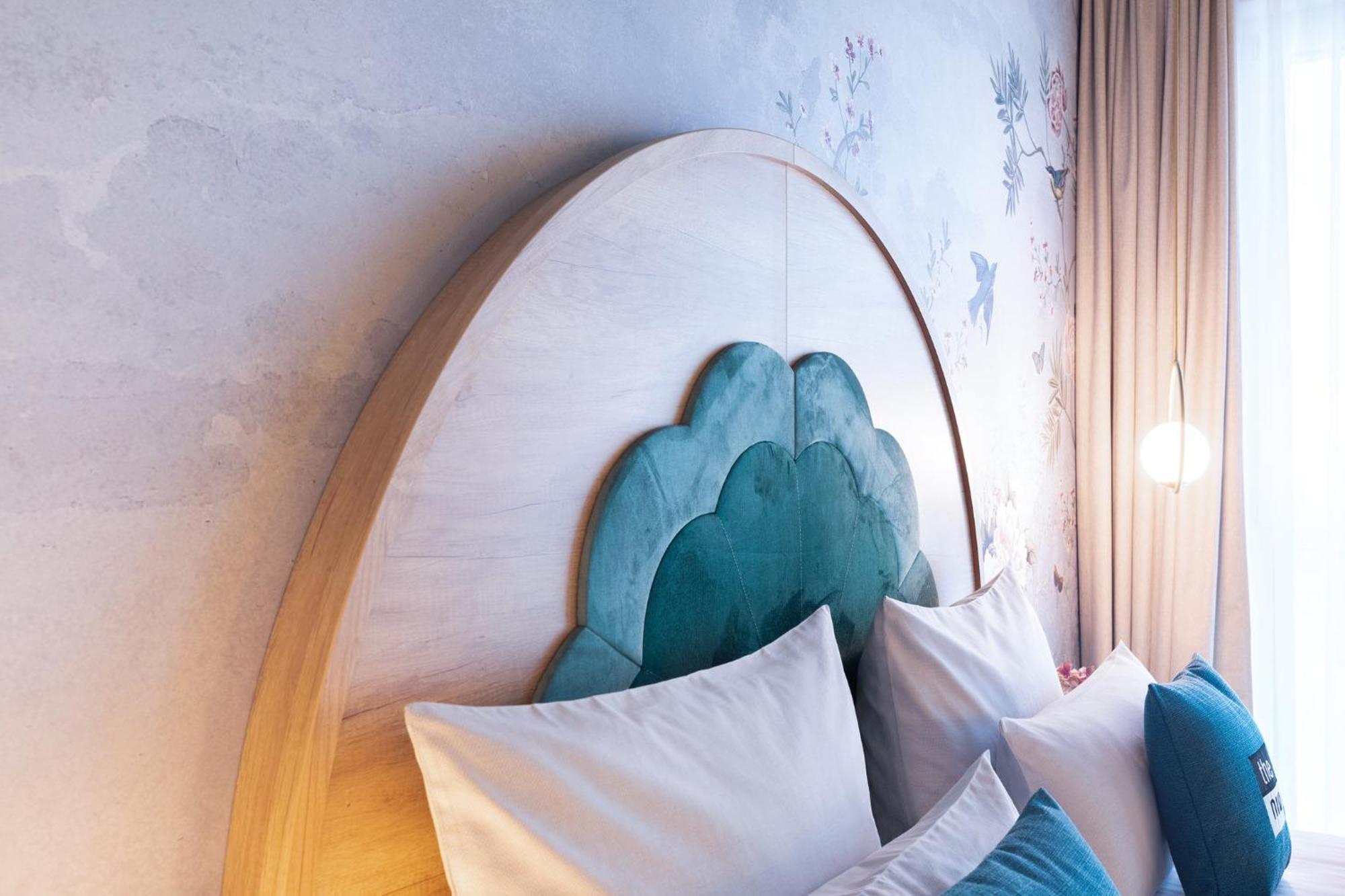 Premium Zimmer mit Queensize-Bett und Küchenzeile