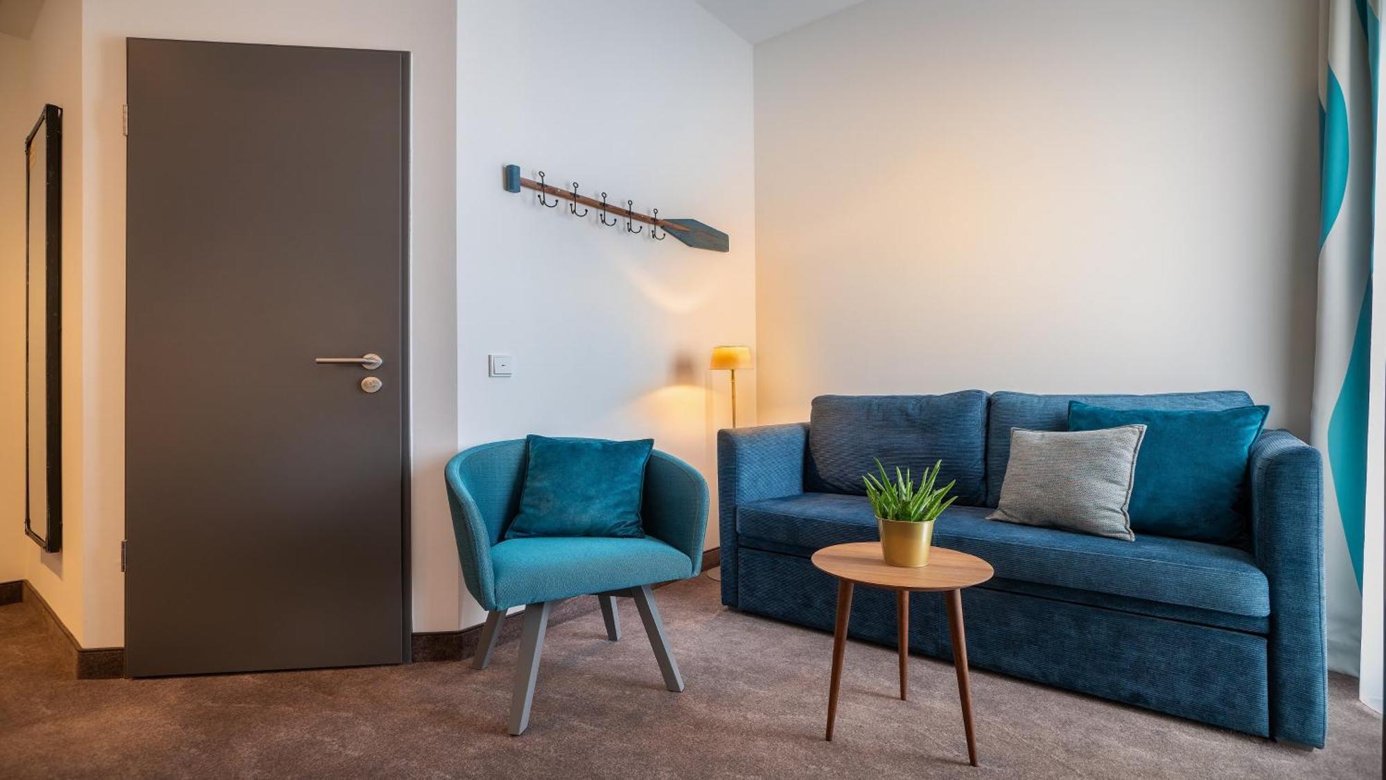 Premium Zimmer mit Queensize-Bett und Schlafsofa