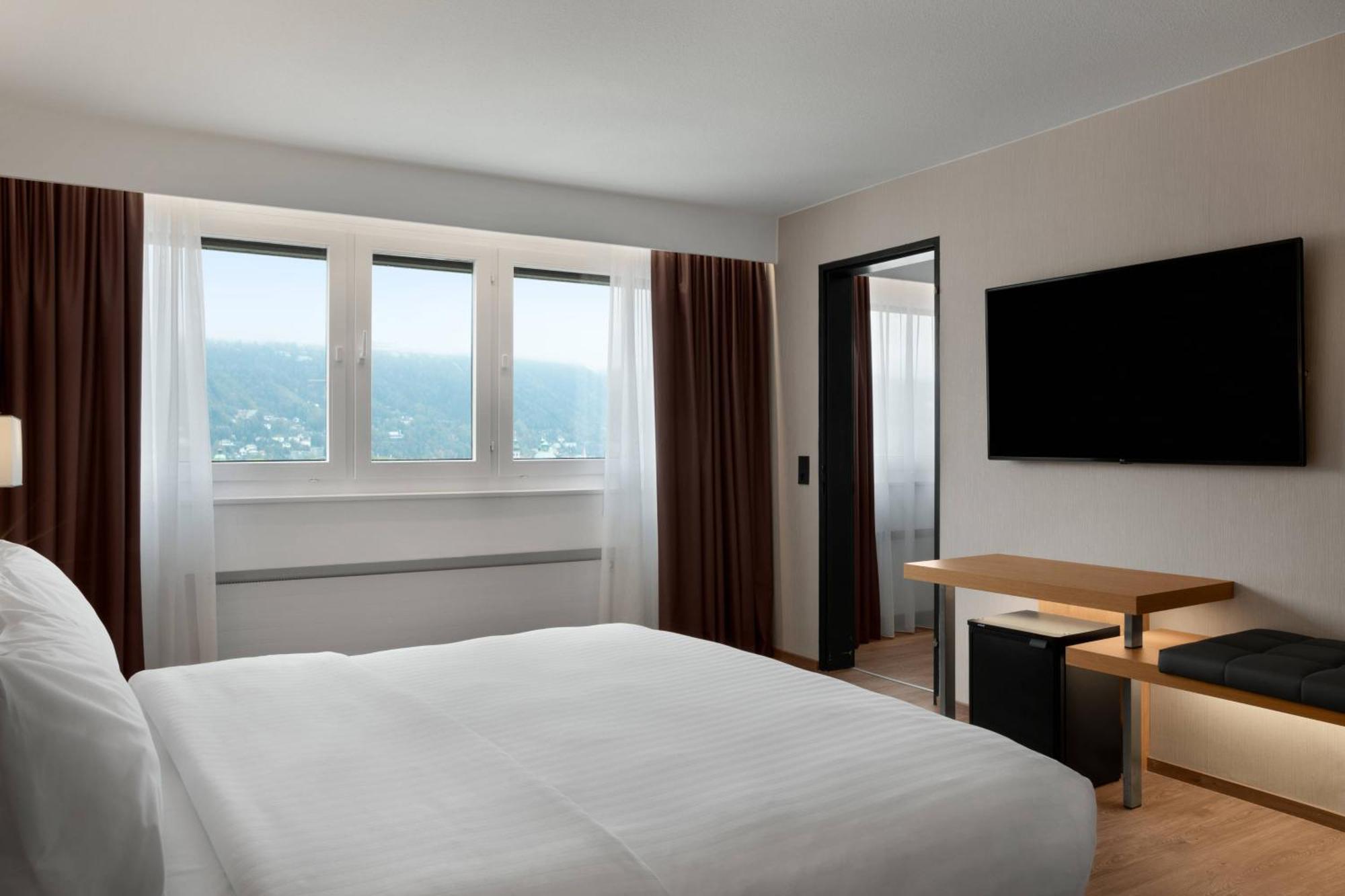 One Bedroom Suite with King Bed and mountain View - High Floor