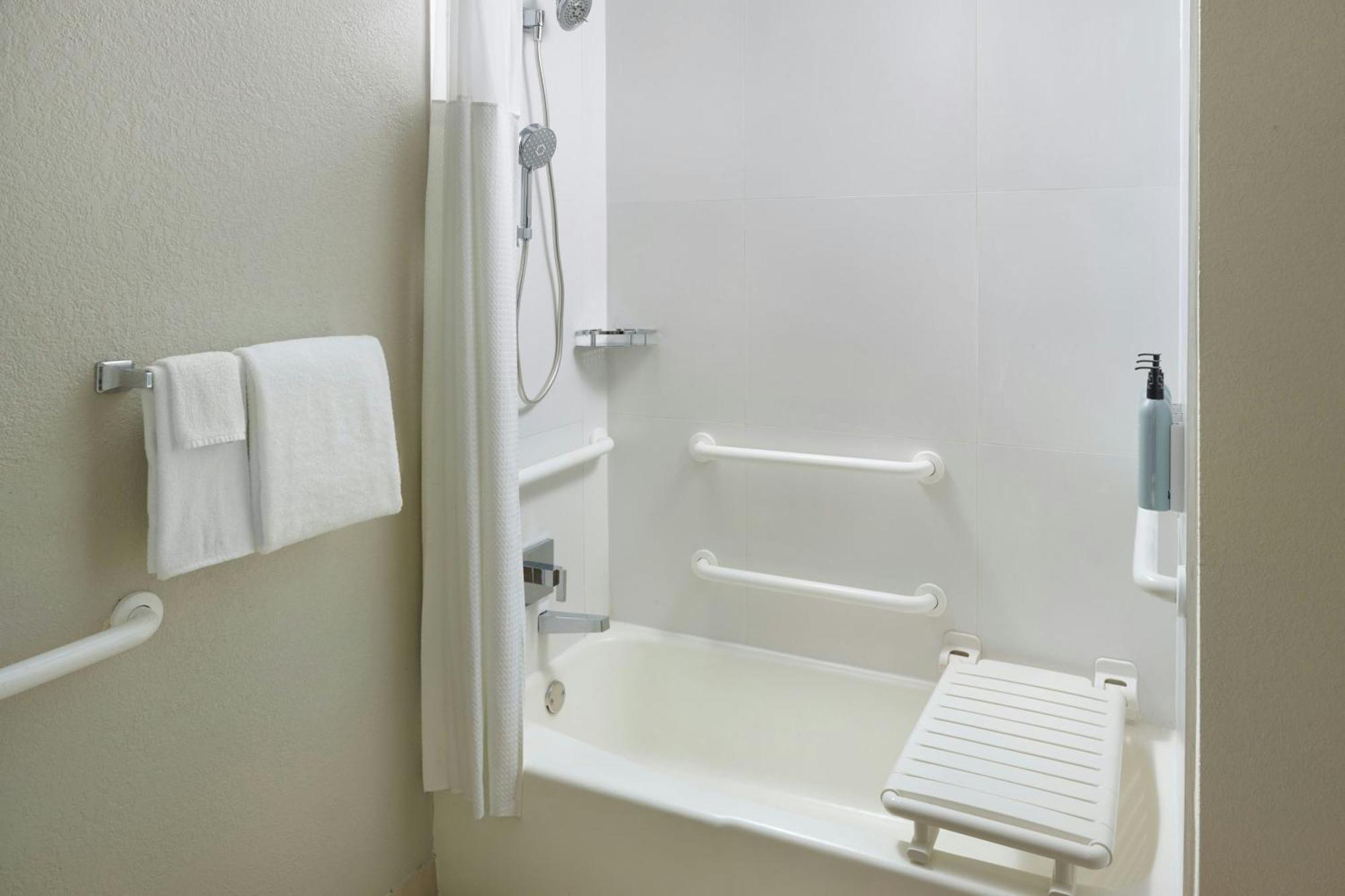 King Room with Sofa Bed and Transfer Shower – Mobility and Hearing Accessible