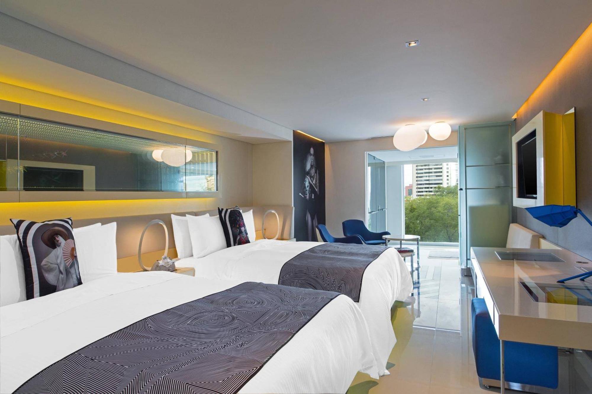 Deluxe Queen Room Two Queen Beds Partial City View
