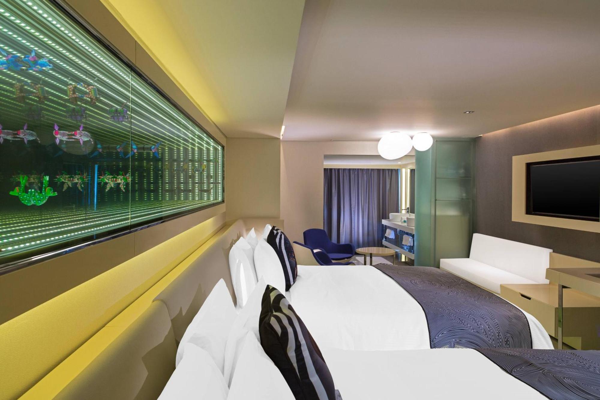 Deluxe Queen Room Two Queen Beds Partial City View