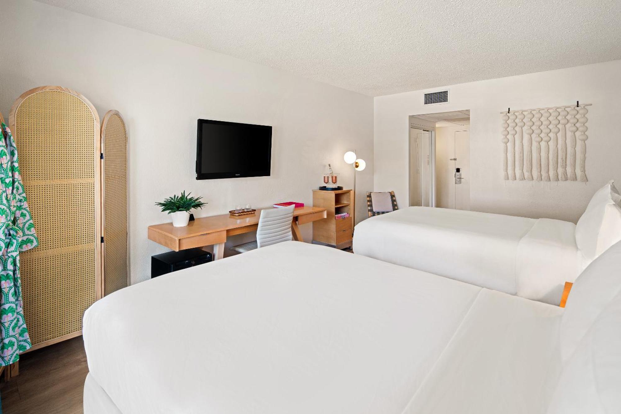 Quadruple Room with Queen Bed and Balcony - Non-Smoking