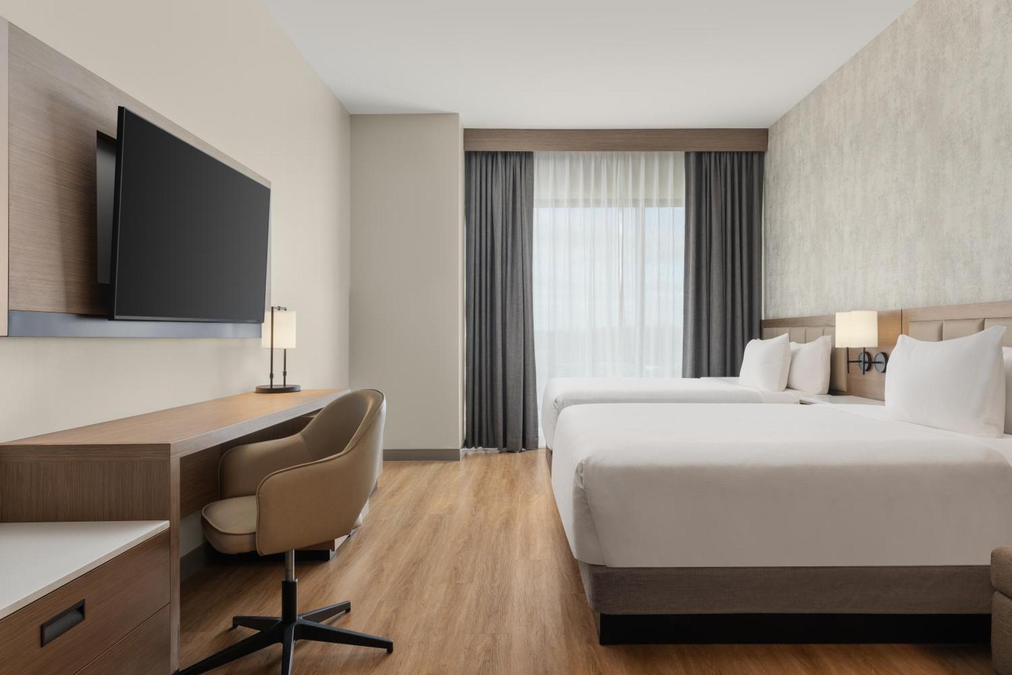 Specialty Queen Room with Two Queen Beds and Sofa Bed
