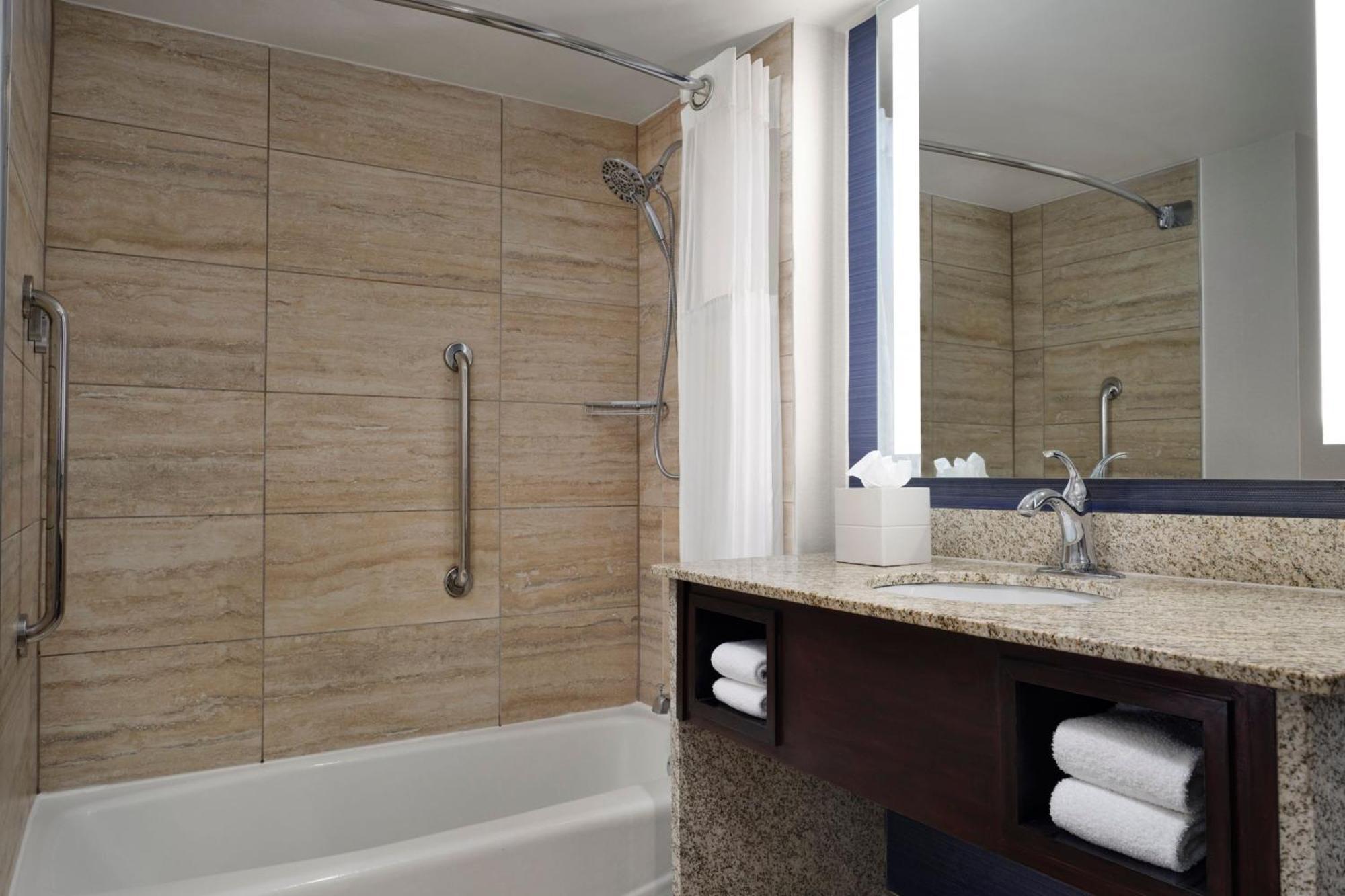 Standard King Room Adapted Tub Mobility Hearing Accessible