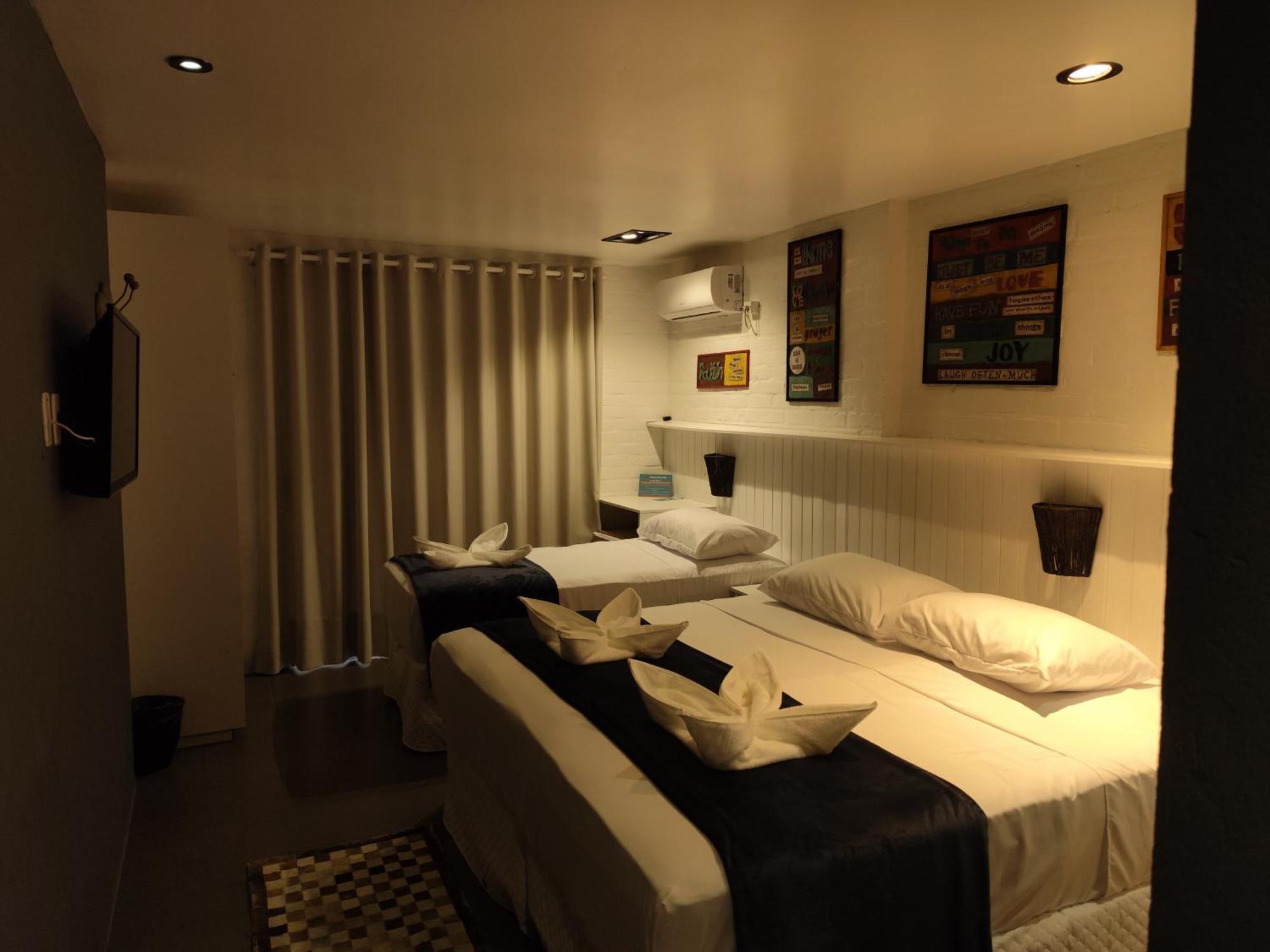 Quarto Triplo com Vista do Jardim