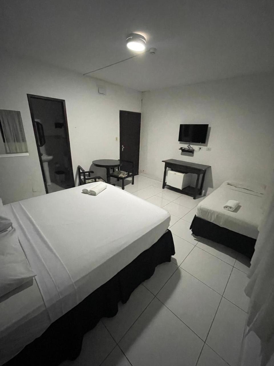 Quarto Triplo Executivo