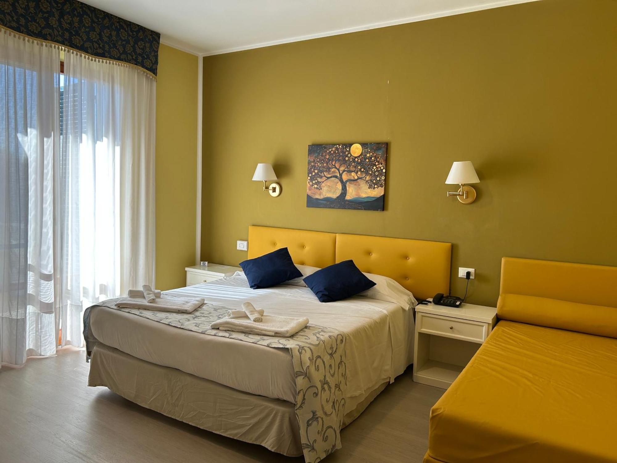 Deluxe Triple Room